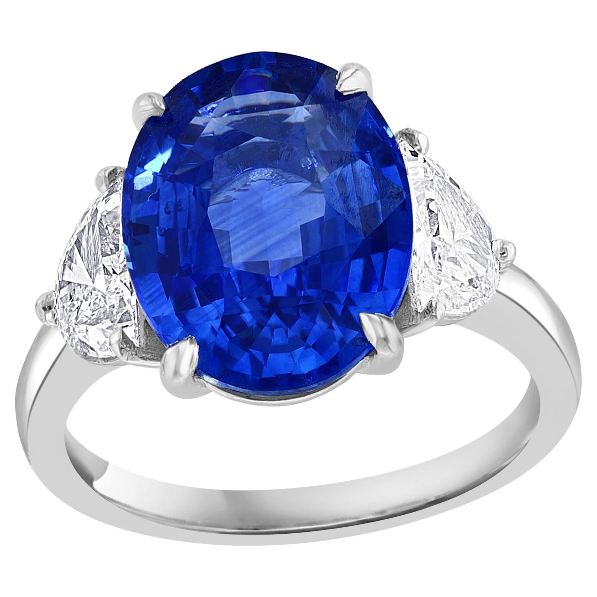 5.96 Carat Oval Blue Sapphire Diamond Three-Stone Engagement Ring in Platinum For Sale