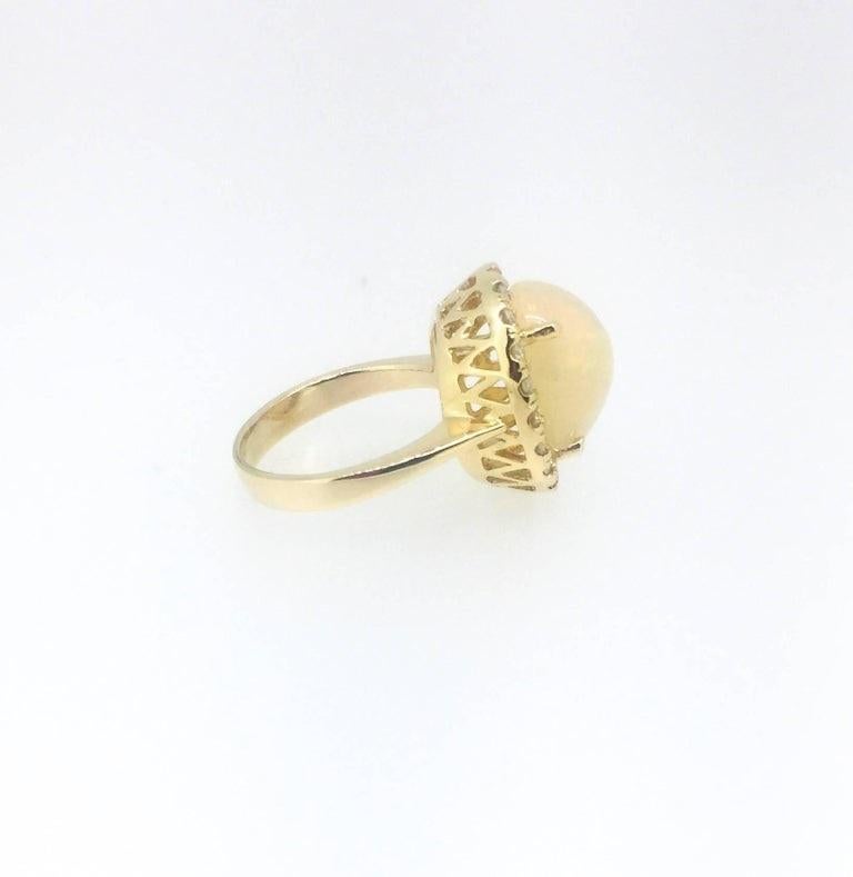 Modern 5.96 Carat Oval Cut Opal Diamond 14 Karat Yellow Gold Ring