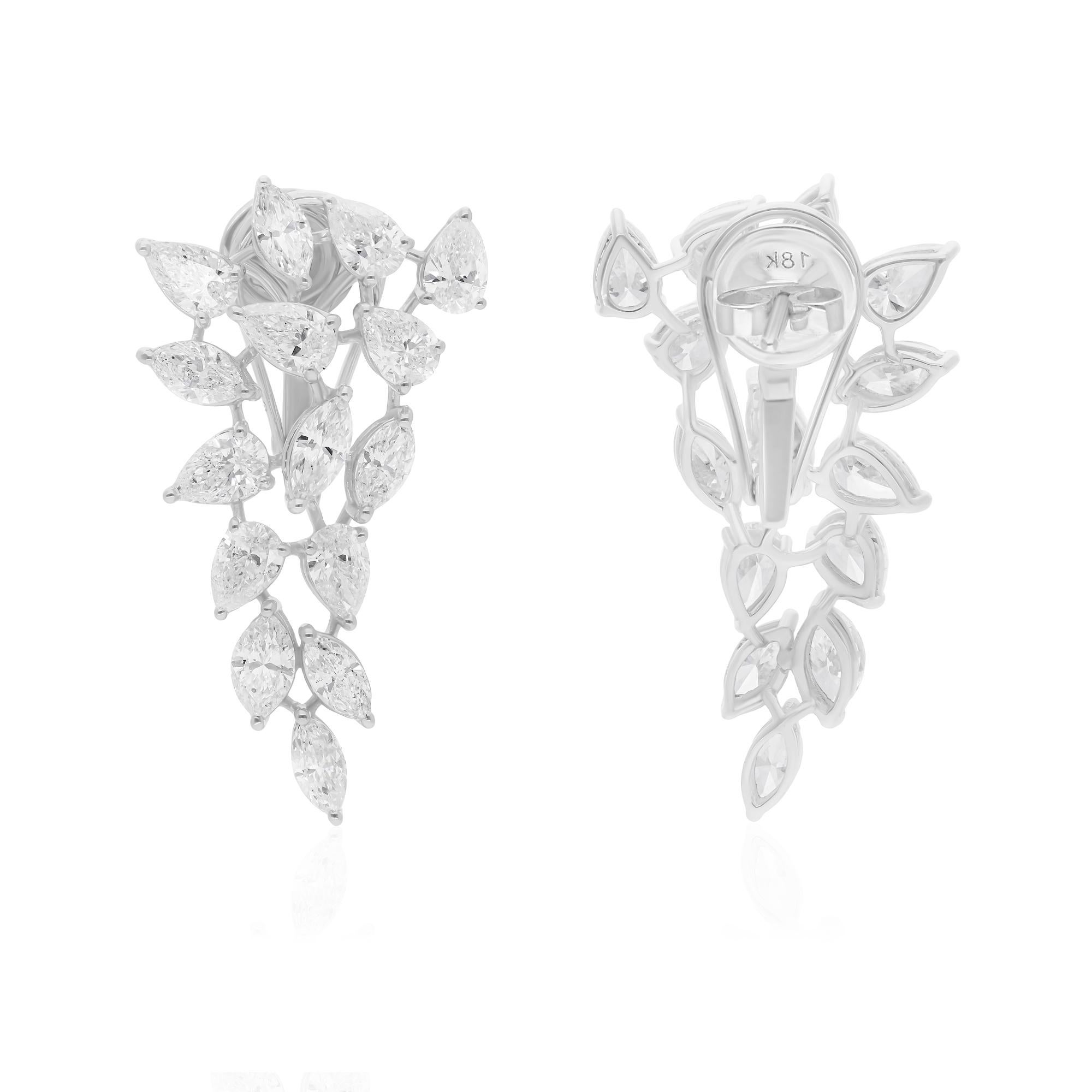 Coulées dans de l'or 14 carats, ces boucles d'oreilles exquises sont serties de 5,96 carats de diamants étincelants.

Suivez la vitrine de Spectrum Jewels pour découvrir la dernière collection et les pièces exclusives. Spectrum Jewels est fièrement