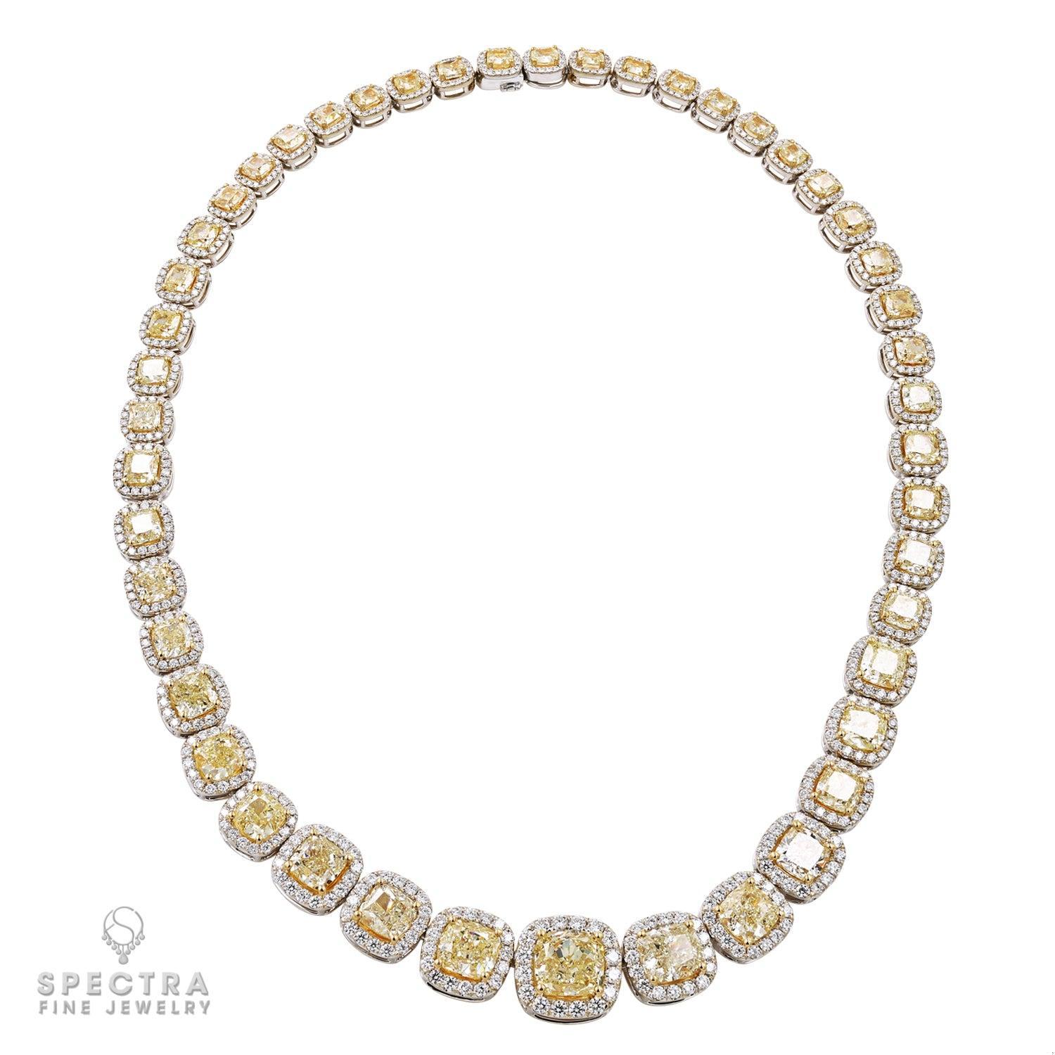 This stunning Riviera necklace showcases a mesmerizing array of 47 graduating yellow diamonds totaling 50.46 carats. Each diamond radiates warmth and brilliance, creating a captivating ombre effect along the neckline. Accentuating the vibrant yellow