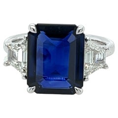 5.97 Carat Emerald Cut Ceylon Sapphire
Diamond Three Stone Ring 5.97 Carat Emerald Cut Ceylon Sapphire
Diamond Three Stone Ring