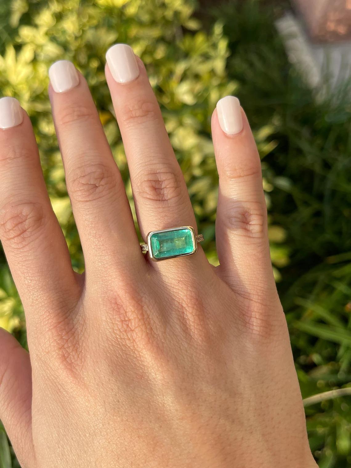 5.97tcw 14K East-West Emerald-Emerald Cut & Diamond Accent Bezel Gold Ring For Sale 3