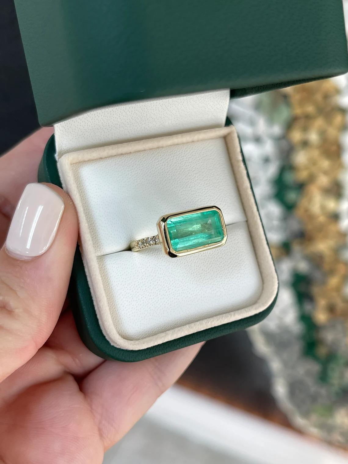 5.97tcw 14K East-West Emerald-Emerald Cut & Diamond Accent Bezel Gold Ring For Sale 4