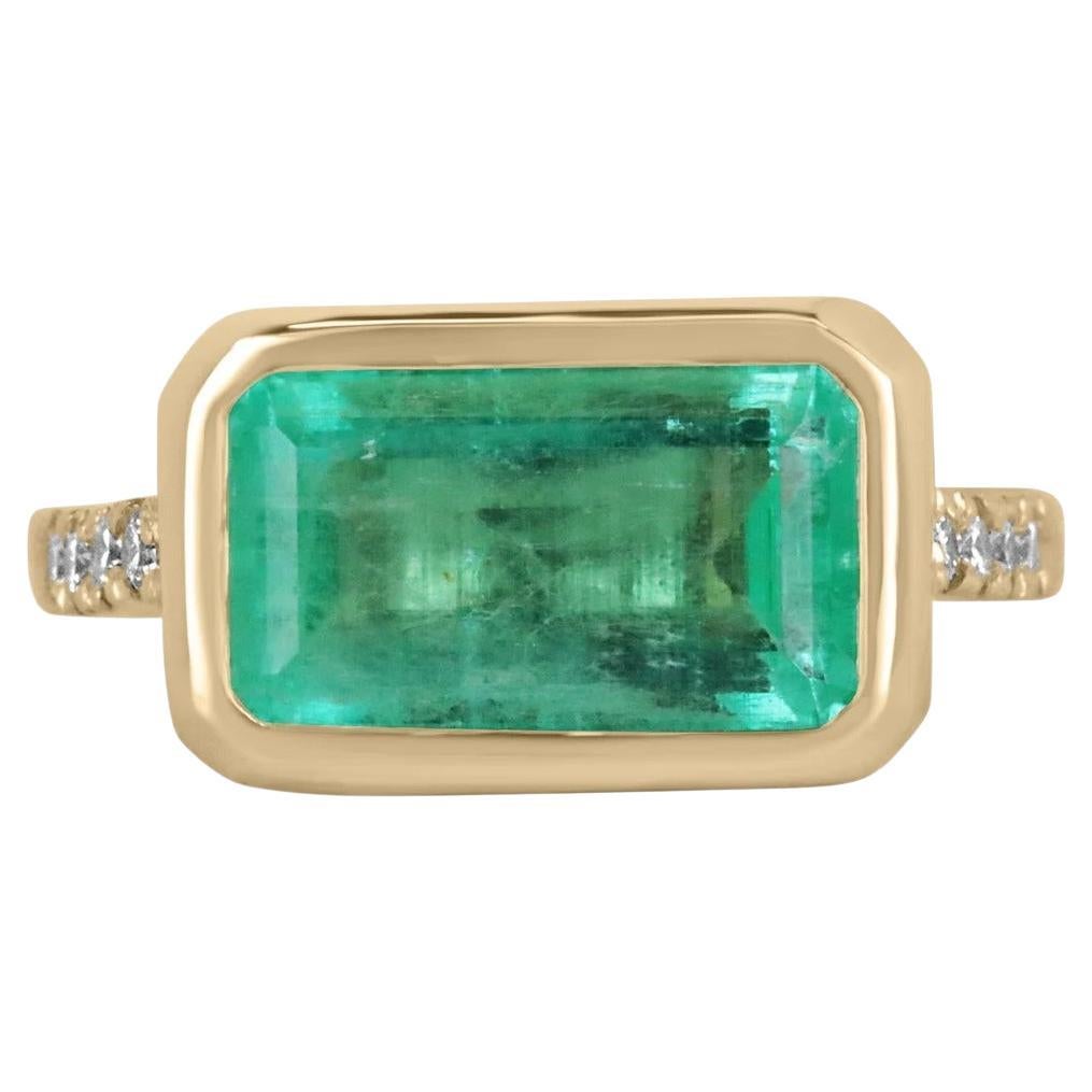 5.97tcw 14K East-West Emerald-Emerald Cut & Diamond Accent Bezel Gold Ring For Sale