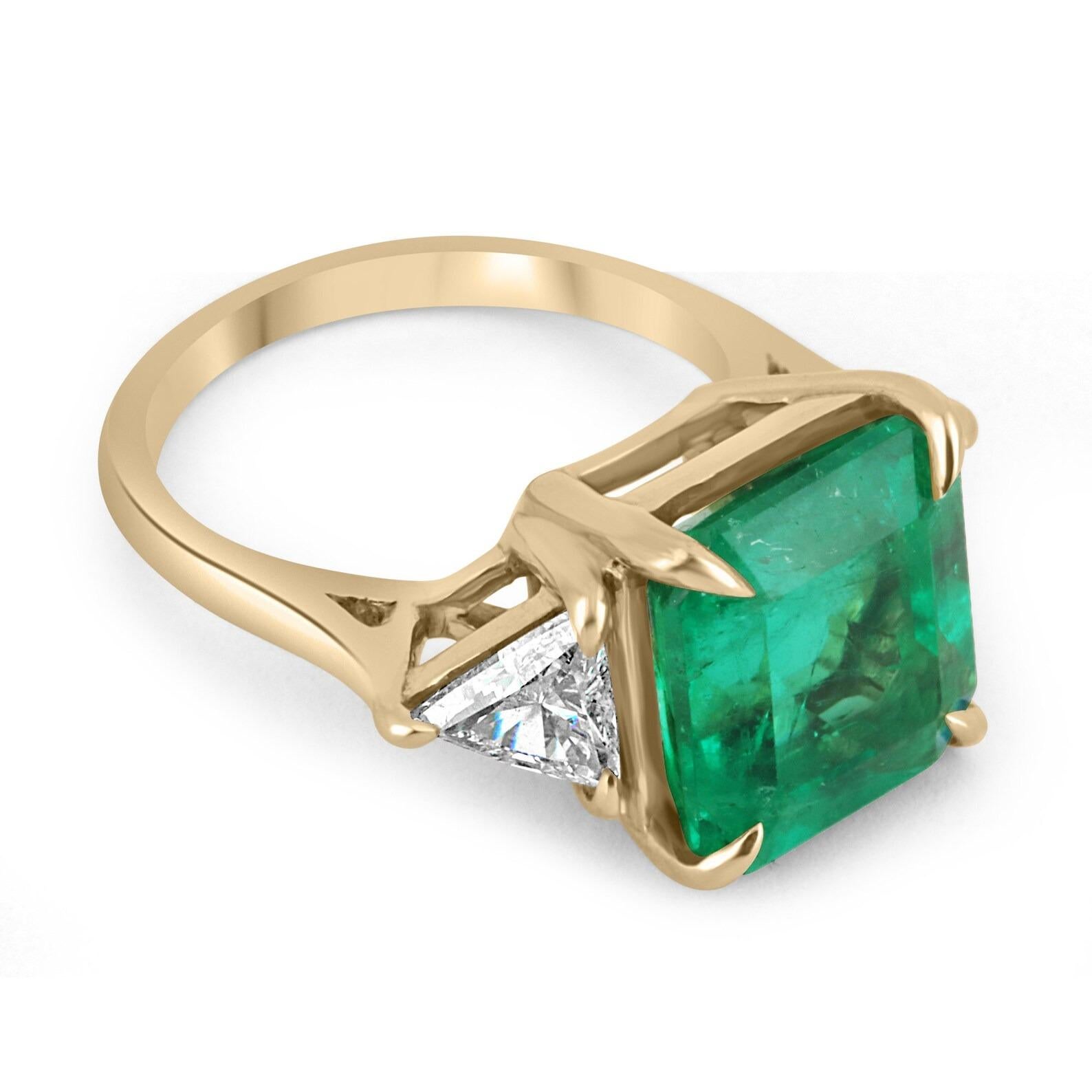 emerald ring with trillion side diamonds