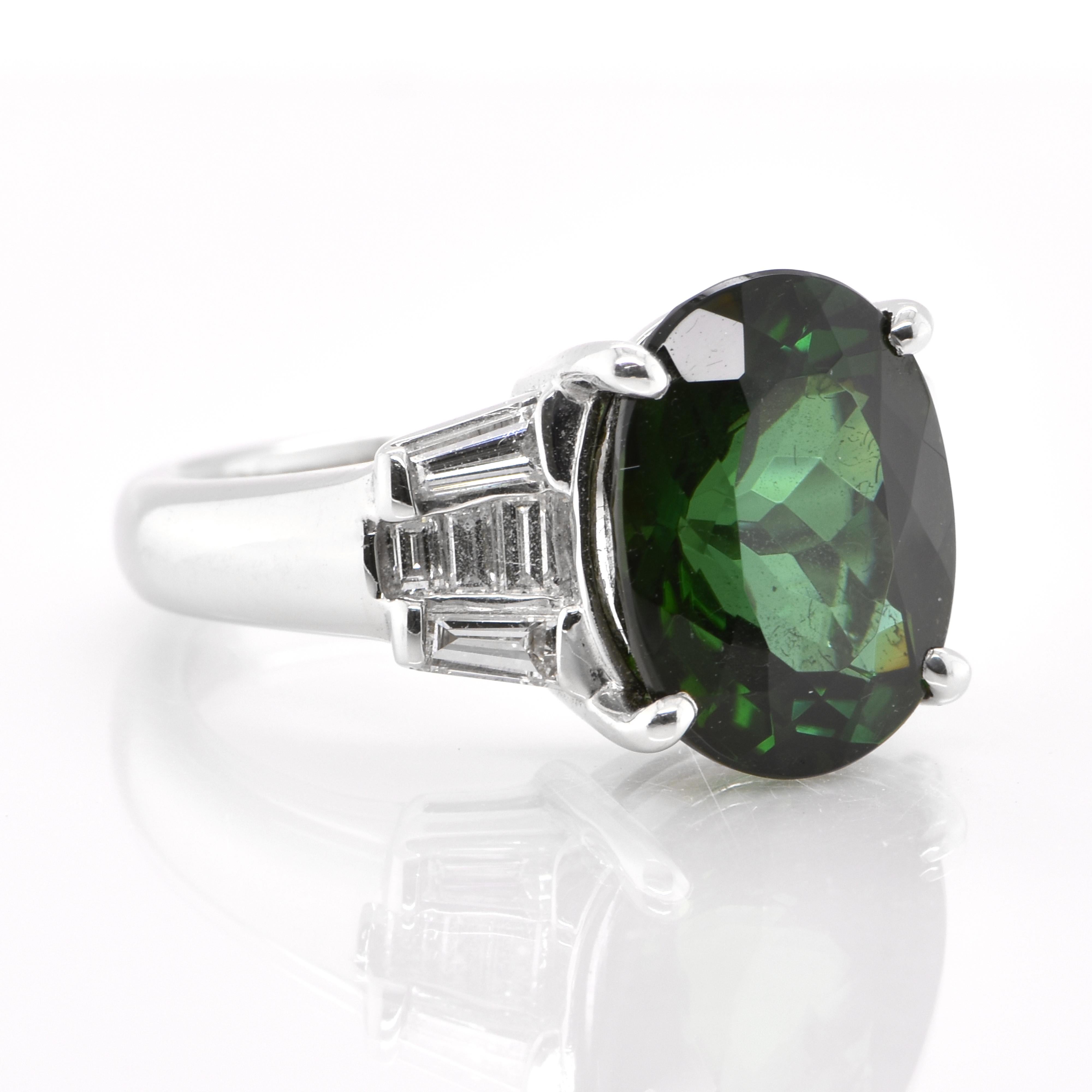 A beautiful Cocktail Ring featuring a 5.98 Carat Natural Chrome Tourmaline and 0.58 Carats of Diamond Accents set in Platinum. Tourmalines were first discovered by Spanish conquistadors in Brazil in 1500s. The name Tourmaline comes from Sinhalese