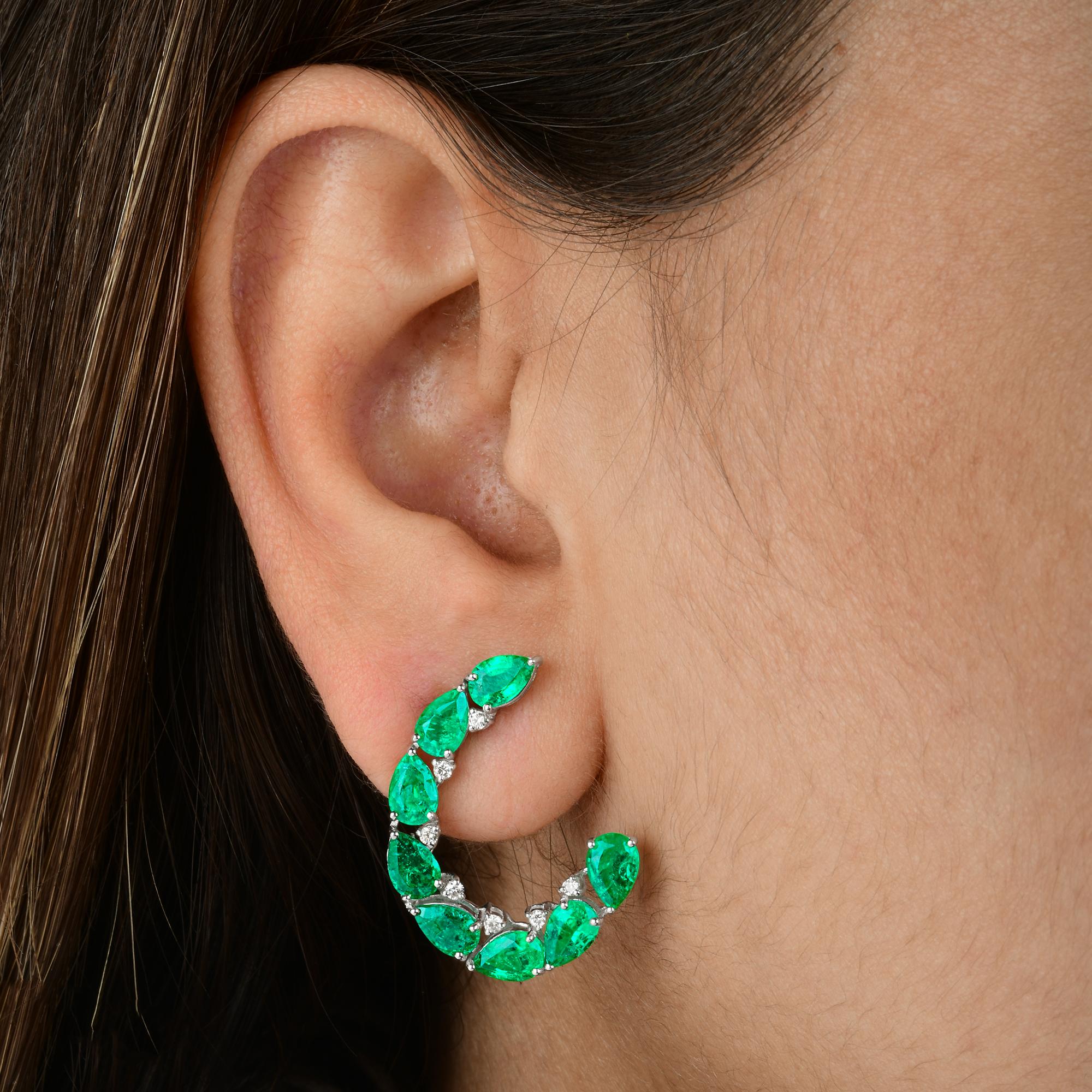 5.98 TCW Zambian Emerald Round Brilliant Diamond Stud Earrings 14k White Gold
These earrings feature a unique C-shaped stud design, meticulously set with pear-shaped emeralds arranged in a beautifully flowing curve.
Emeralds are symbols of love,