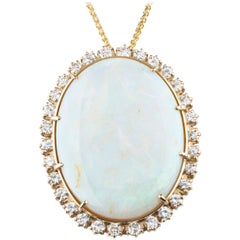 Vintage 59.87 Carat Opal with Diamond Bezel Pendant 14 Karat Yellow Gold Necklace