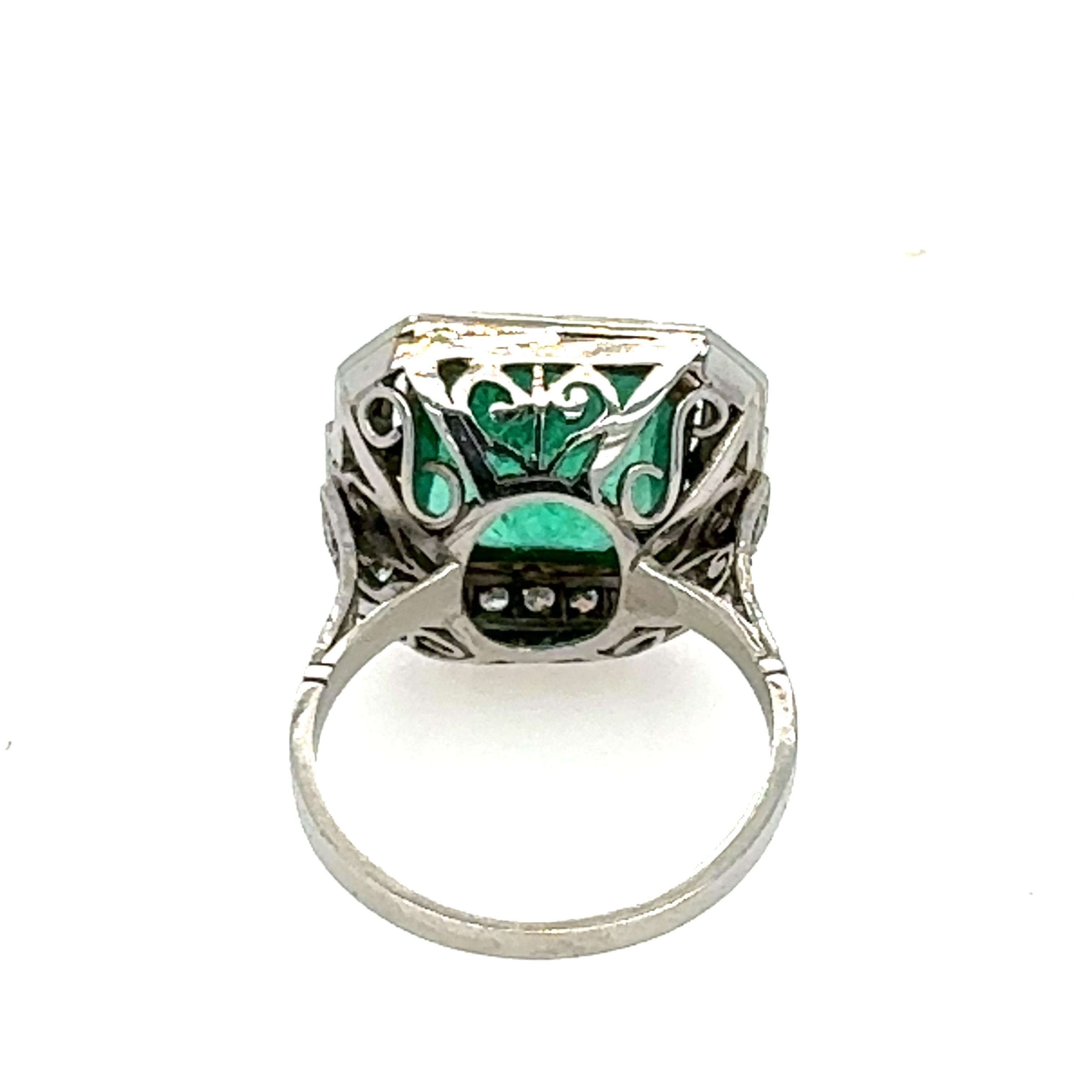 Emerald Cut 5.98carat Columbian Emerald Ring with Diamonds For Sale