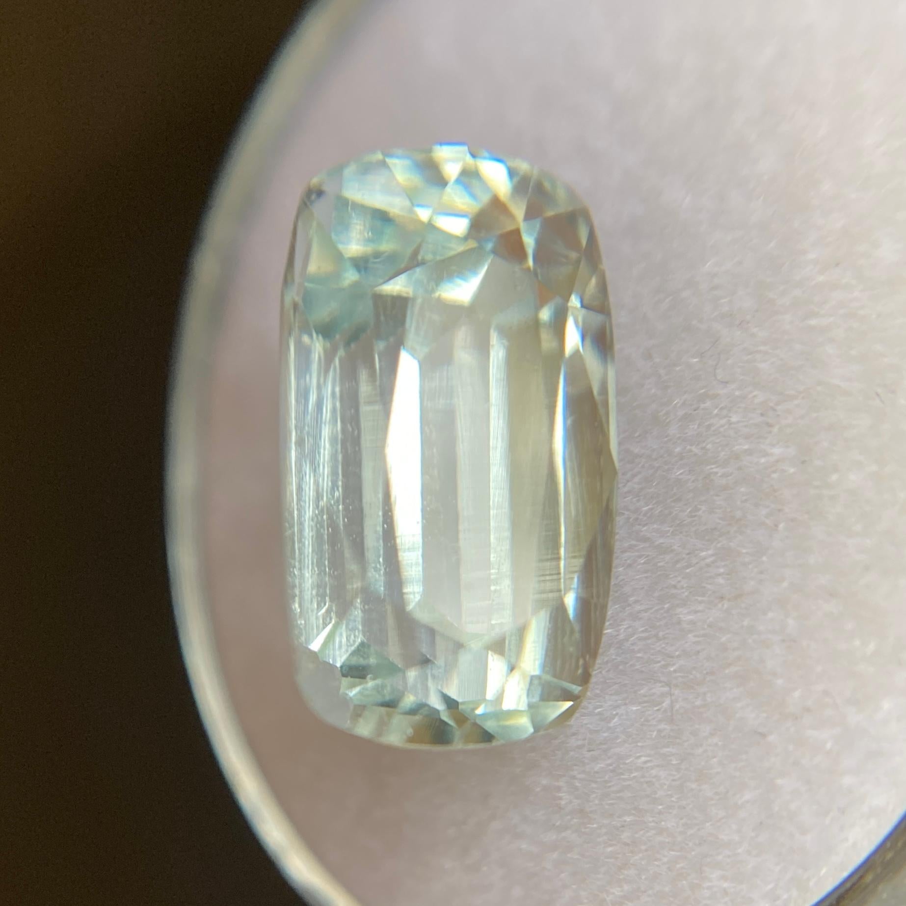 Natural Blue Aquamarine Gemstone.

5.98 Carat with a light blue colour and good clarity. A a clean gem with only some small natural inclusions visible when looking closely.

Also has an excellent cushion cut with ideal polish to show great shine and