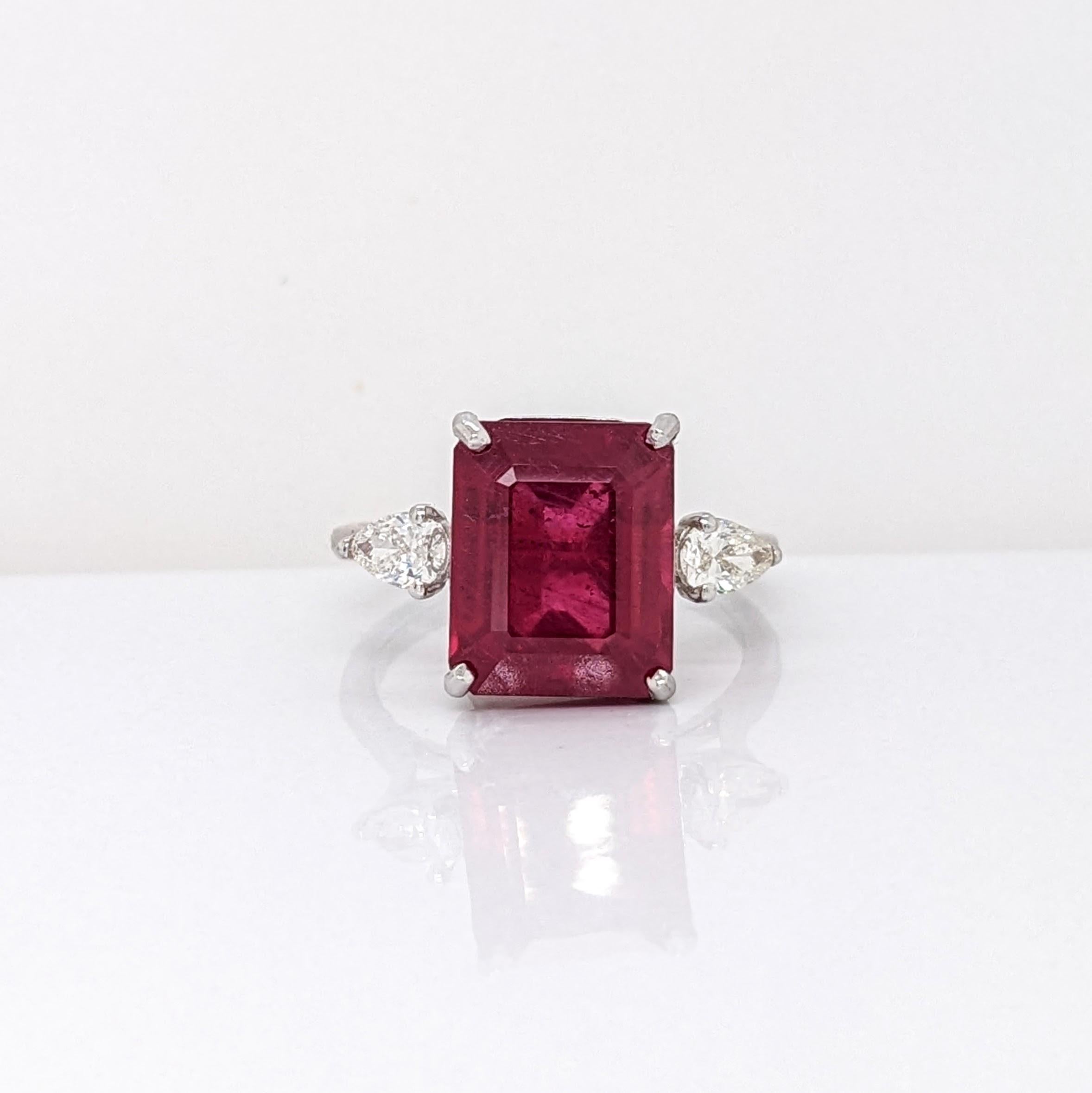 This statement ring features a stunning 5.93 carat red ruby gemstone with two natural earth mined diamonds set in solid 14K gold. This ring makes a lovely July birthstone gift for your loved ones!

Specifications

Item Type: Ring
Center