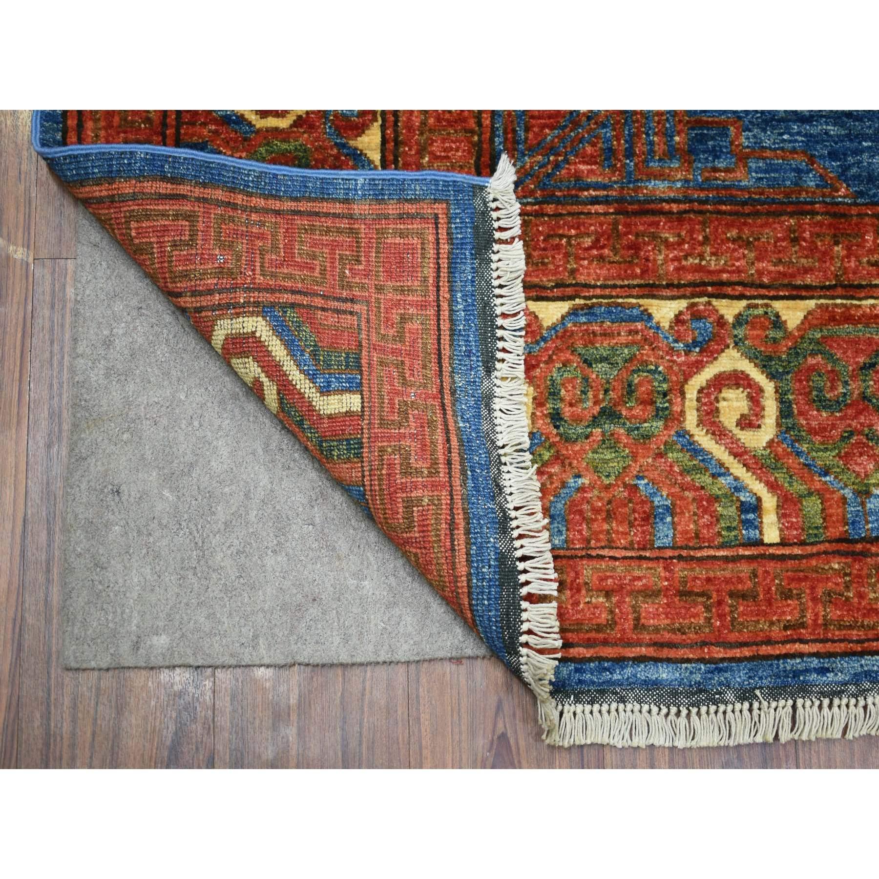 This is a truly genuine one-of-a-kind Denim Blue Hand Knotted Turkeman Ersari with Khotan Design Soft and Shiny Wool Oriental Rug. It has been Knotted for months and months in the centuries-old weaving craftsmanship techniques by expert