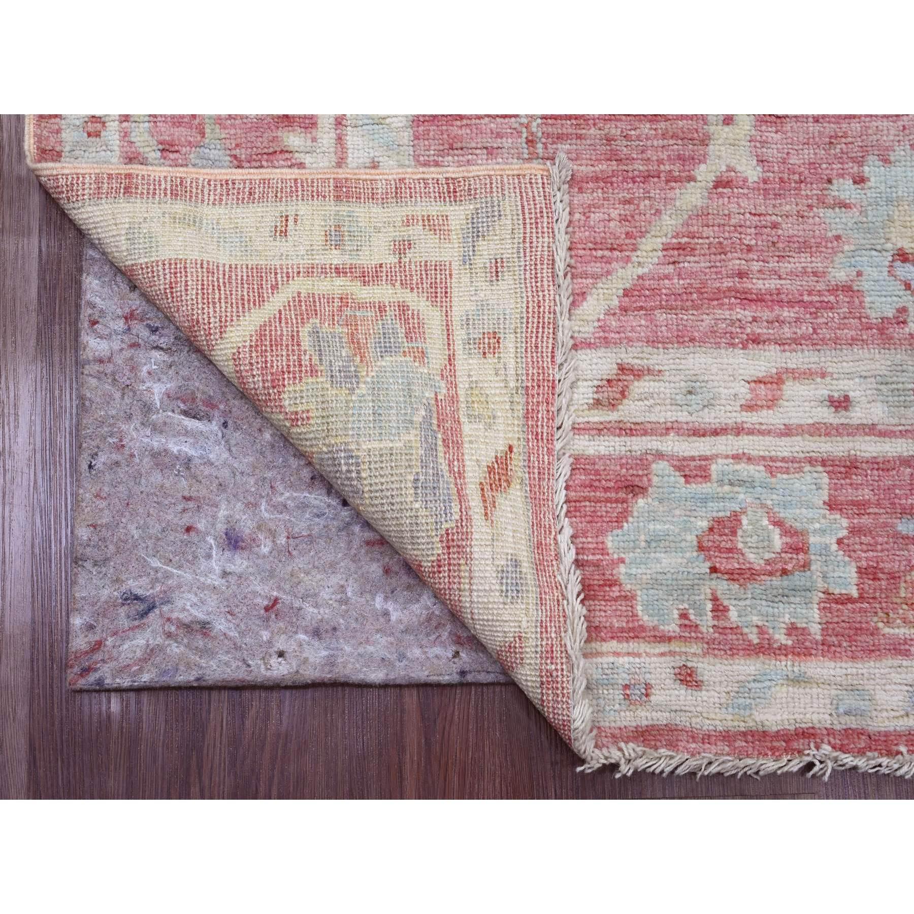 Rouge Pink, Hand Knotted, Afghan Angora Oushak with Large Leaf Design, Veggie Dyes, 100% Wool, Oriental Rug
Primary materials: Wool 
Latex: No Pile 
height: 0.25 Inches
Style: Transitional
Primary color: Pink
Secondary colors: Red, Blue, Ivory,