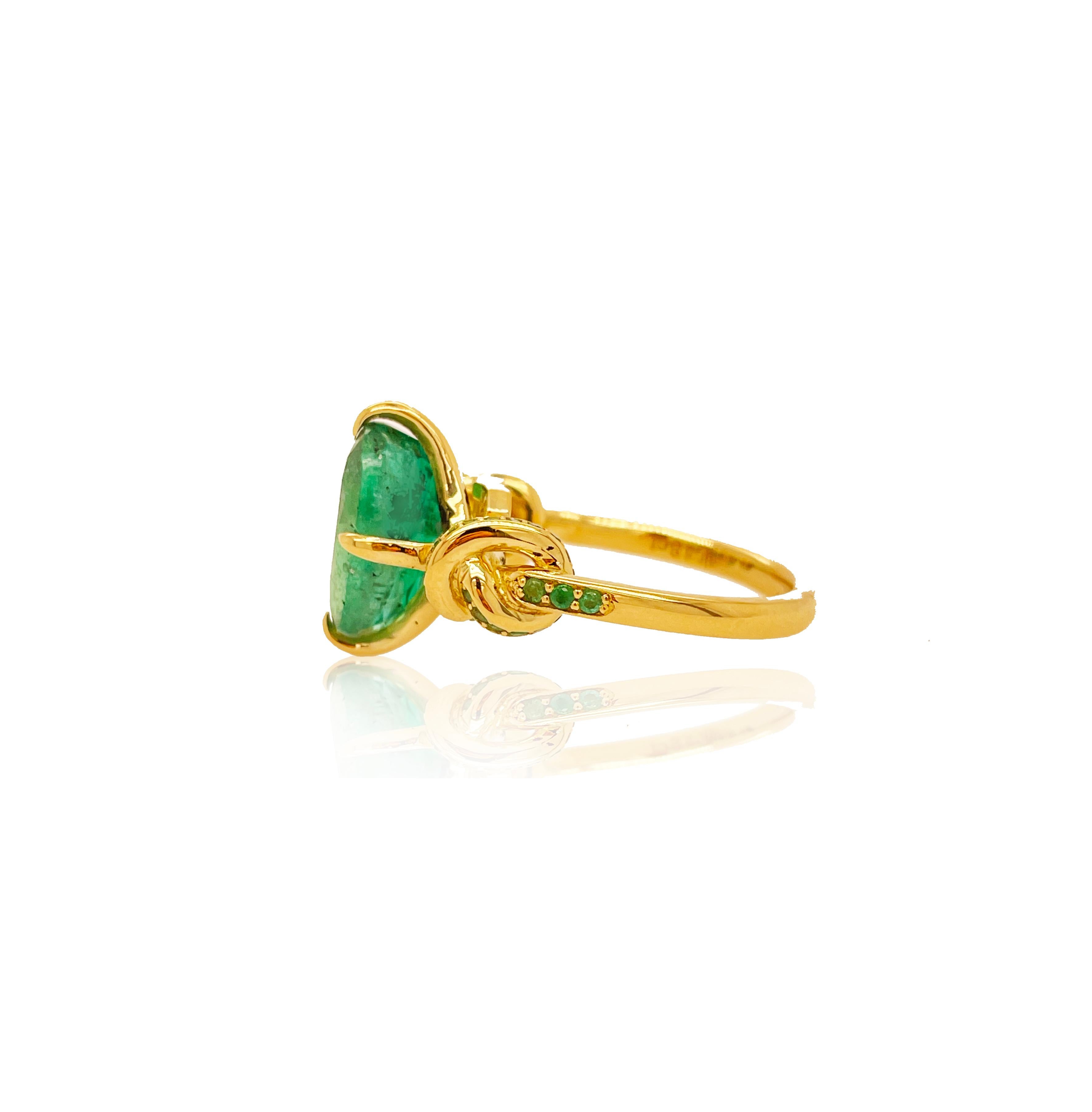 4.01ct Emerald Oval Cut Forget Me Knot Ring in 18Carat Yellow Gold with Emeralds For Sale 3