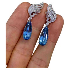 Orecchini a goccia con acquamarina 5ct e diamante bianco 0,50ct in oro bianco 18k