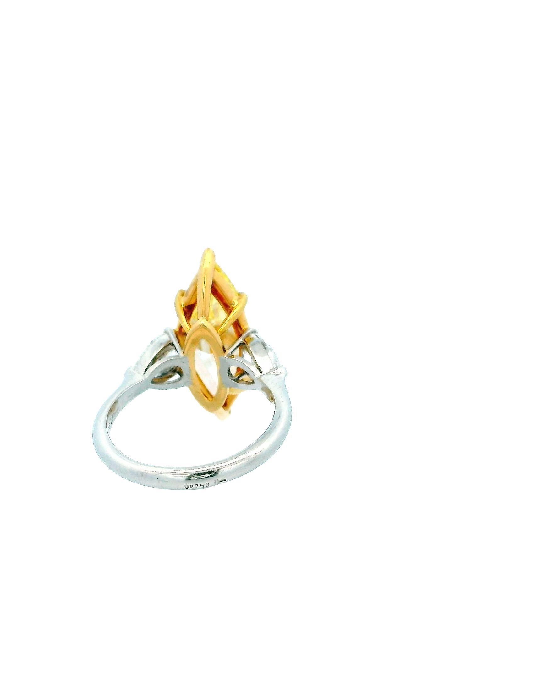 Women's 5ct Fancy Intense Yellow Marquise Cut Diamond Ring For Sale