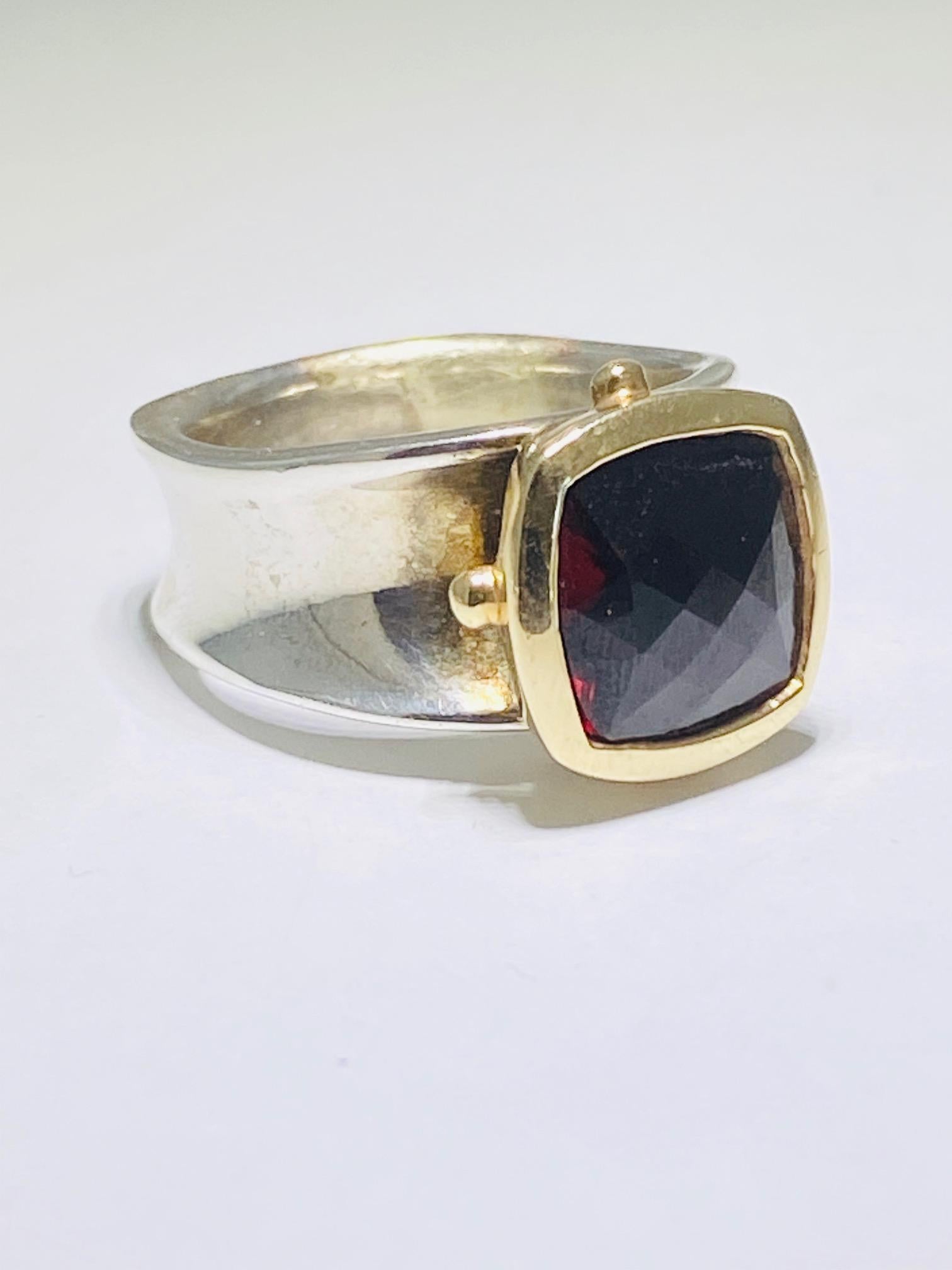 This handmade garnet ring is super stunning and unique!!! It is a great piece for daily wear or for a special occasion!! Red is such an dominant and vibrant color that goes with any outfit! The garnet is bezel set with 14 karat yellow gold and the