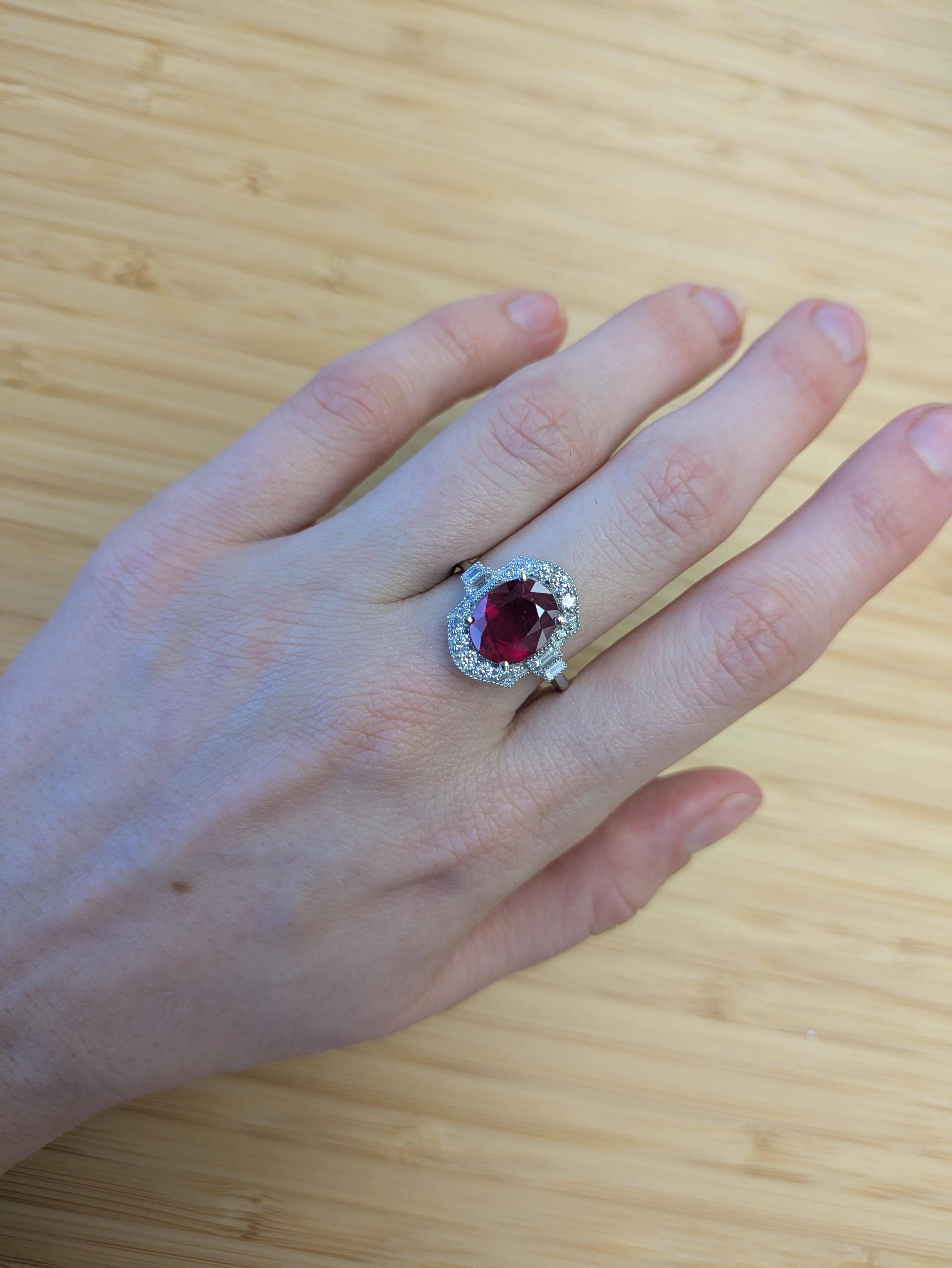 A stunning 5 carat Madagascar Ruby takes center stage in this vintage-inspired ring, set in solid 14k gold. Accented with earth-mined diamonds and framed by intricate milgrain detailing, it's a timeless piece that blends old-world charm with