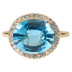5ct Oval-Cut Swiss Blue Topaz & Diamond Halo Engagement Ring in 18K Yellow Gold