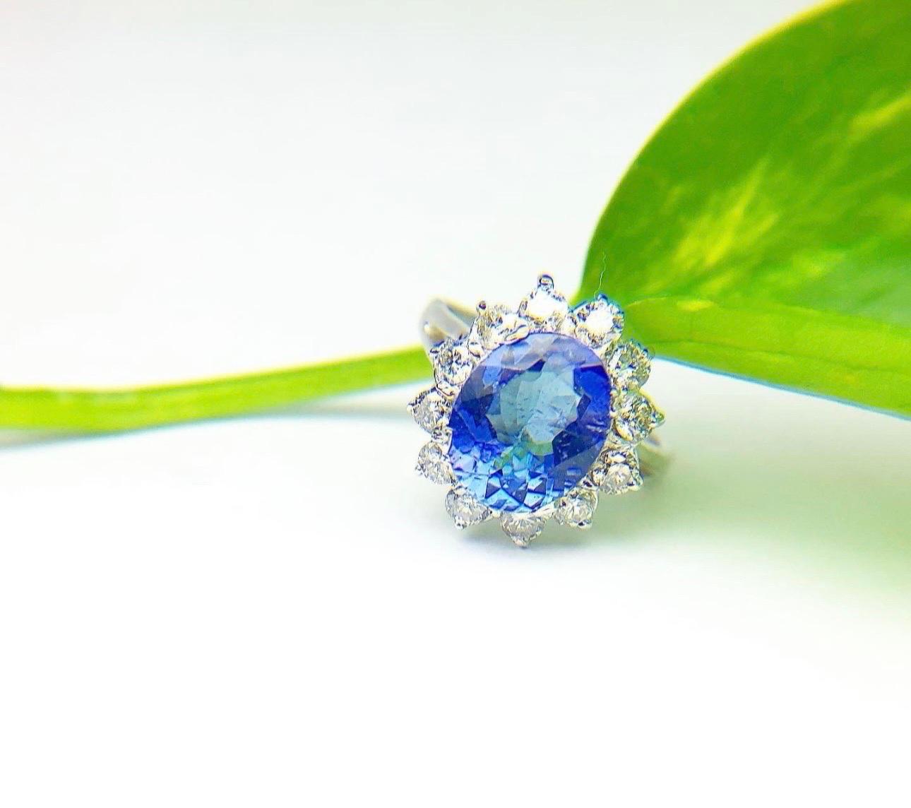 5ct Fine Tanzanite & Diamond ring in 18KT white gold, accompanied by 1.50 carats of diamonds VS clarity and F color. The ring is made in an elegant style with a beautiful lavender Tanzanite. The ring will come in stunning packaging, appraisal and a