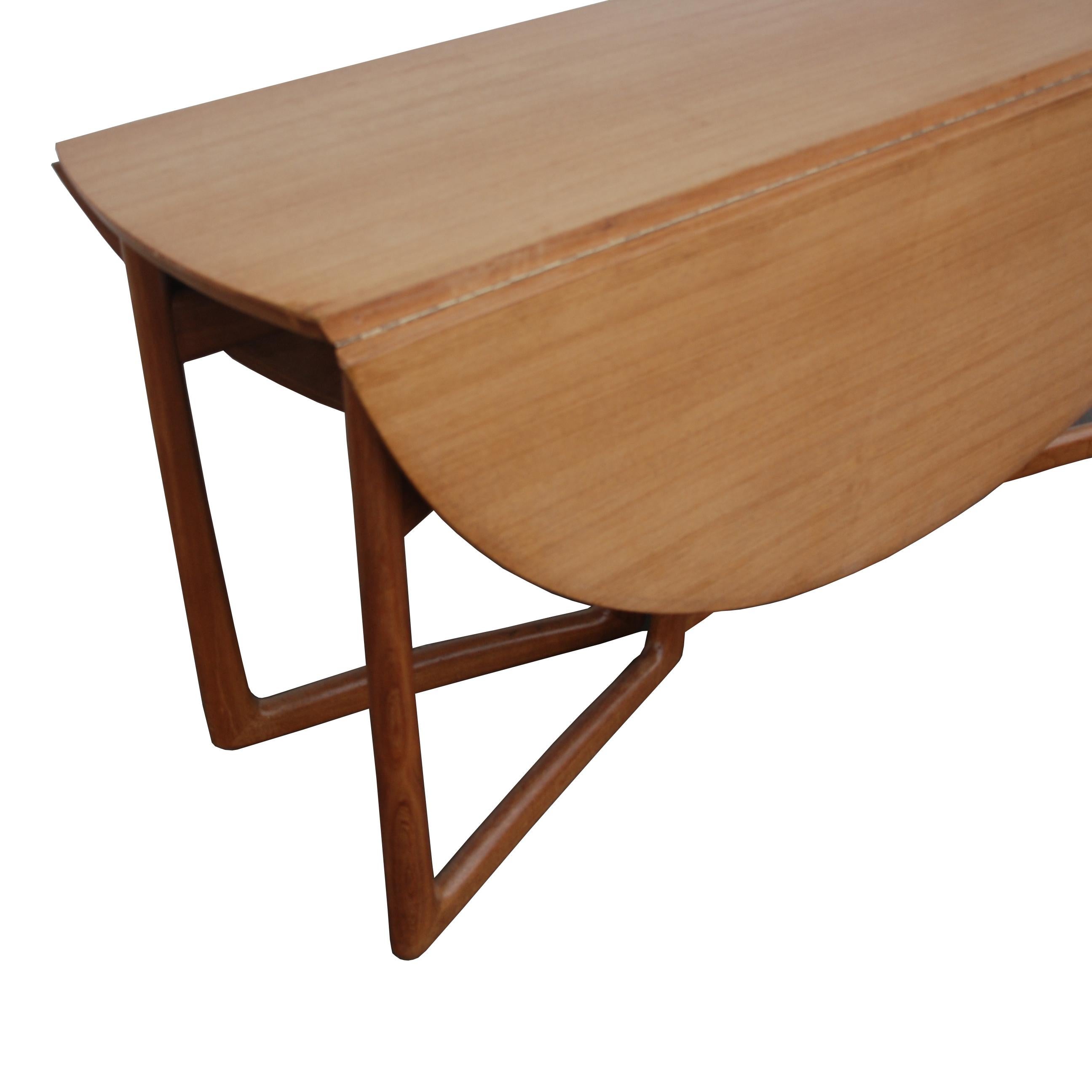 Mid-20th Century 1960s Danish Peter Hvidt Drop-Leaf Dining Table in Teak and Brass For Sale