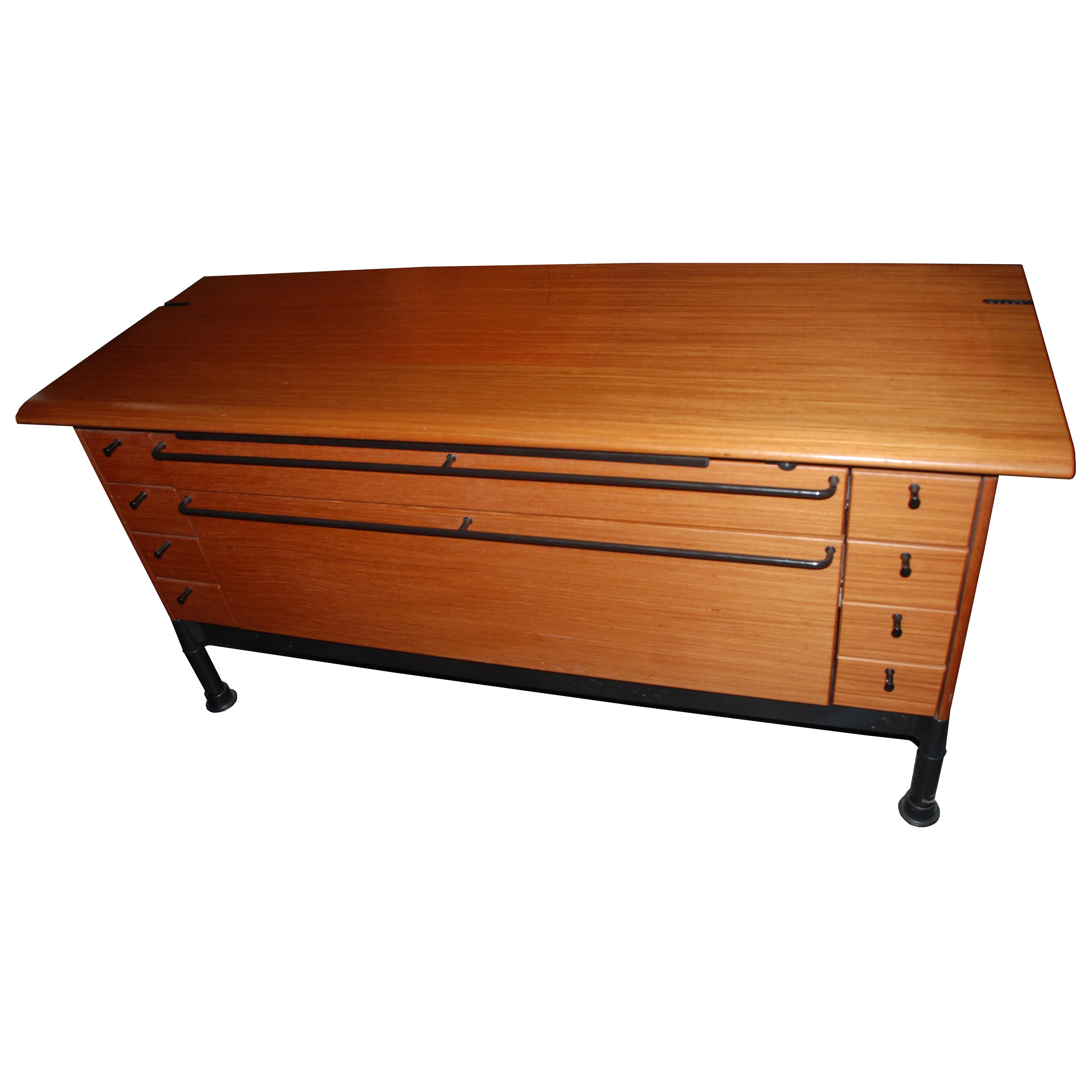 5ft Herman Miller credenza by Geoff Hollington 

Vintage 5 ft Geoff Hollington credenza for Herman Miller. Credenza features 8 small drawers on the sides, and 2 large flat file drawers in the middle.

10 Available 
Also available with bookcase see