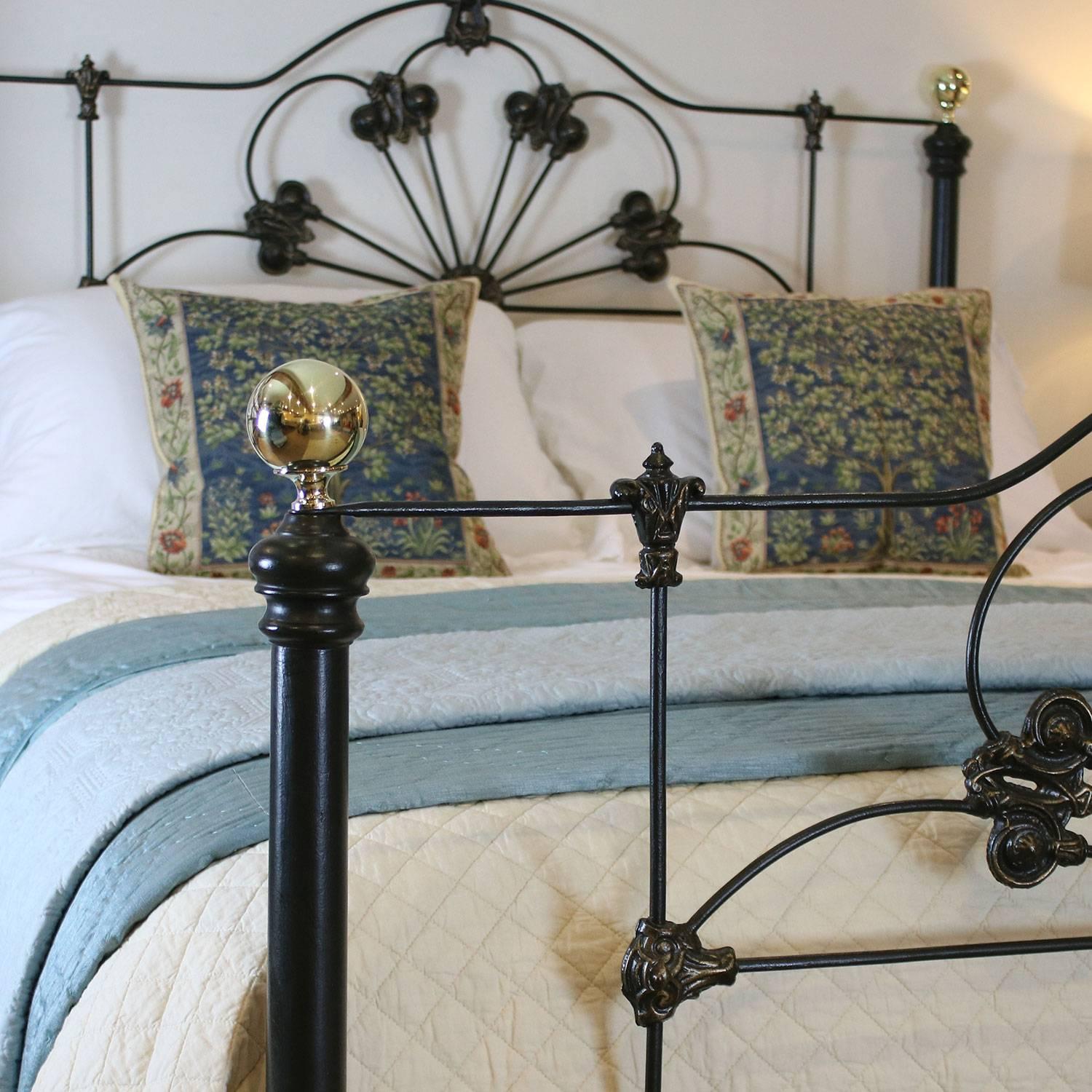 A cast iron antique bed with decorative castings and attractive design finished in olive green with gold highlights.

This bed accepts a British king-size or US queen-size (5ft, 60 inches or 150cm wide) base and mattress set.

The price is for