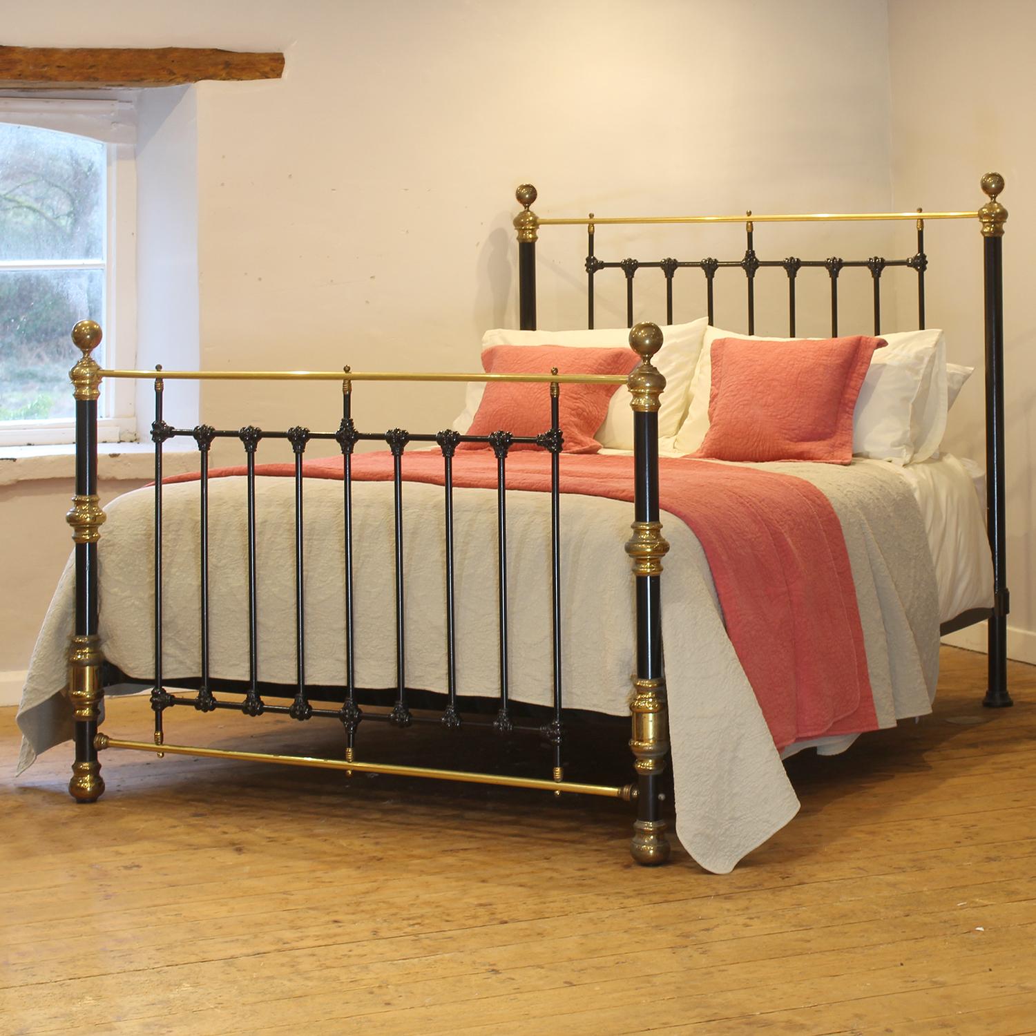 A superb cast iron antique bed finished in black with decorative castings, substantial bed posts, and large brass fittings.

This bed accepts a UK king size or US queen size (5ft, 60in or 150cm wide) base and mattress set.

The price includes a