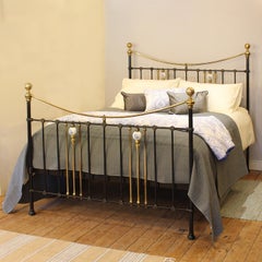5ft Wide Black Metal Antique Bed with Blue Floral Ceramics MK331
