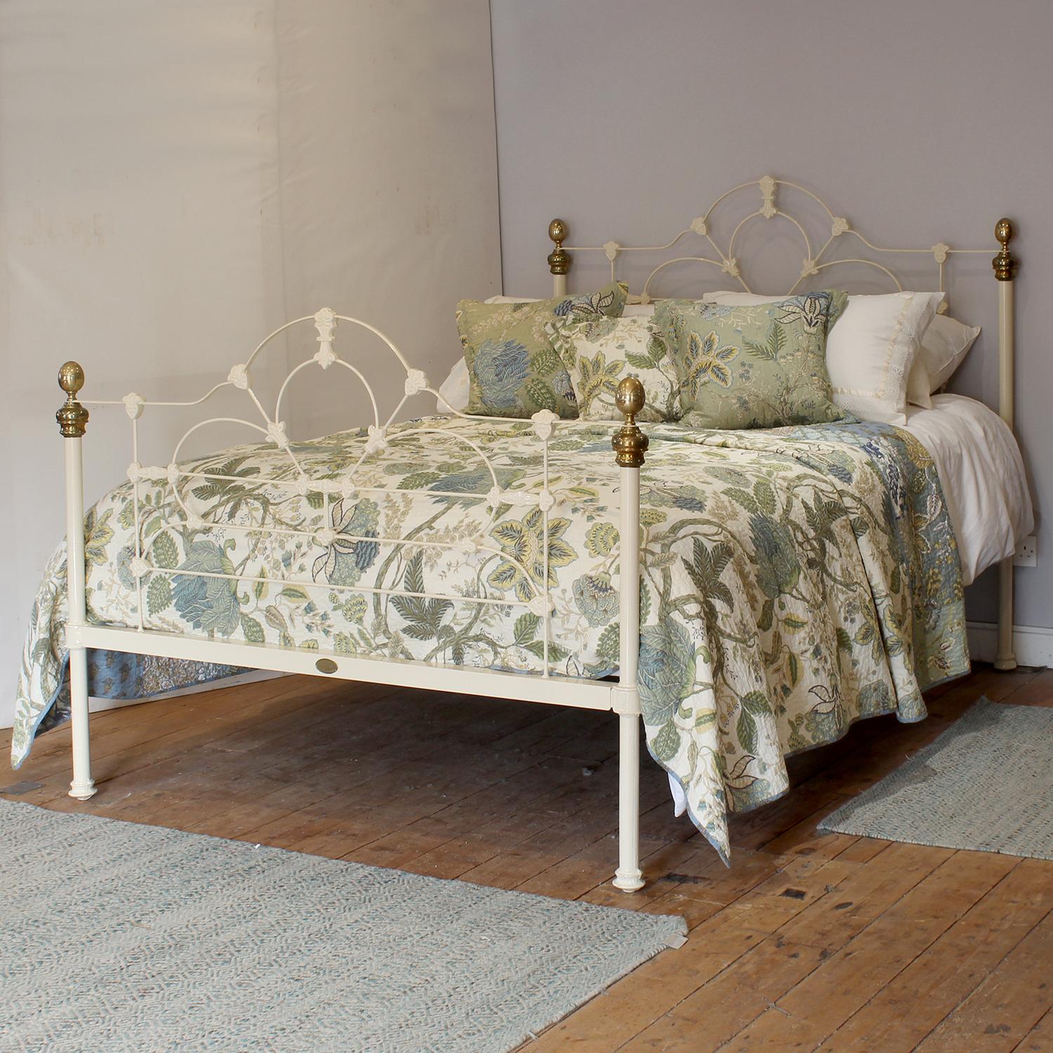 A superb cast iron antique bed finished in cream with decorative design and castings, and brass knobs.

This bed accepts a UK king size or US queen size (5ft, 60in or 150cm wide) base and mattress set.

The price includes a standard firm bed base to