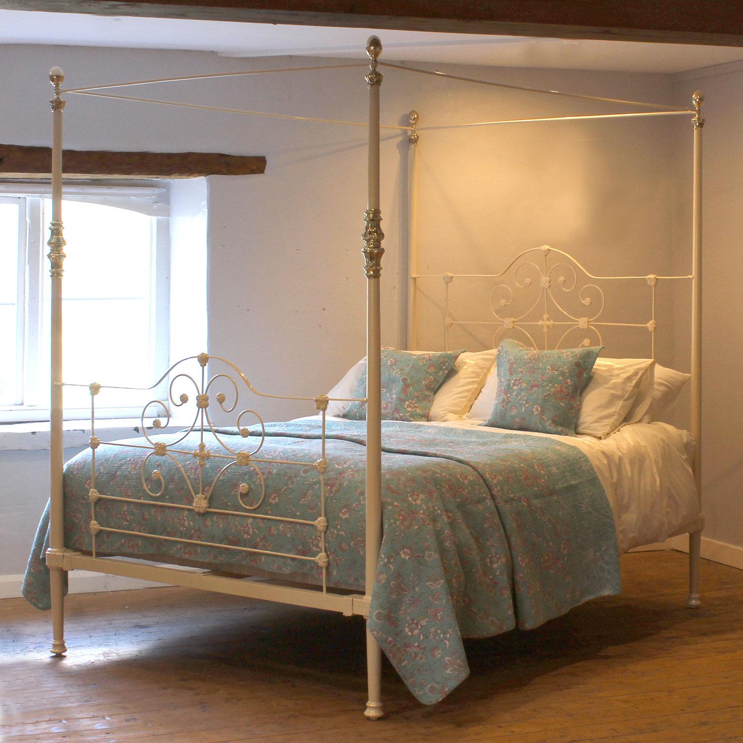 A 5ft wide cast iron antique four poster bed with ornate castings and original brass decoration finished in soft cream with ornate brass fittings and simple panel decoration.

This bed accepts a British King Size or US Queen Size (5ft or 150cm wide)