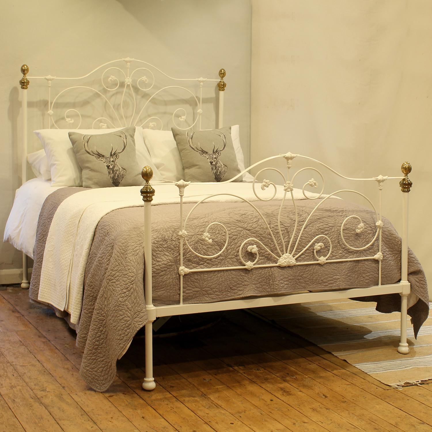 A superb cast iron antique bed finished in white with decorative head and foot panels.

This bed accepts a UK king size or US queen size (5ft, 60in or 150cm wide) base and mattress set.

The price includes a standard firm bed base to support the