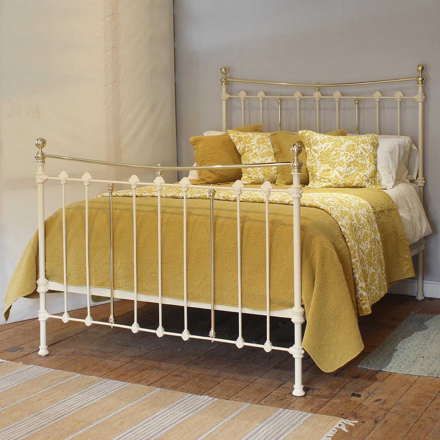 A superb cast iron antique bed finished in soft ivory with decorative castings, gently curving brass top rails and spherical brass knobs.

This bed accepts a UK king size or US queen size (5ft, 60in or 150cm wide) base and mattress set.

The price