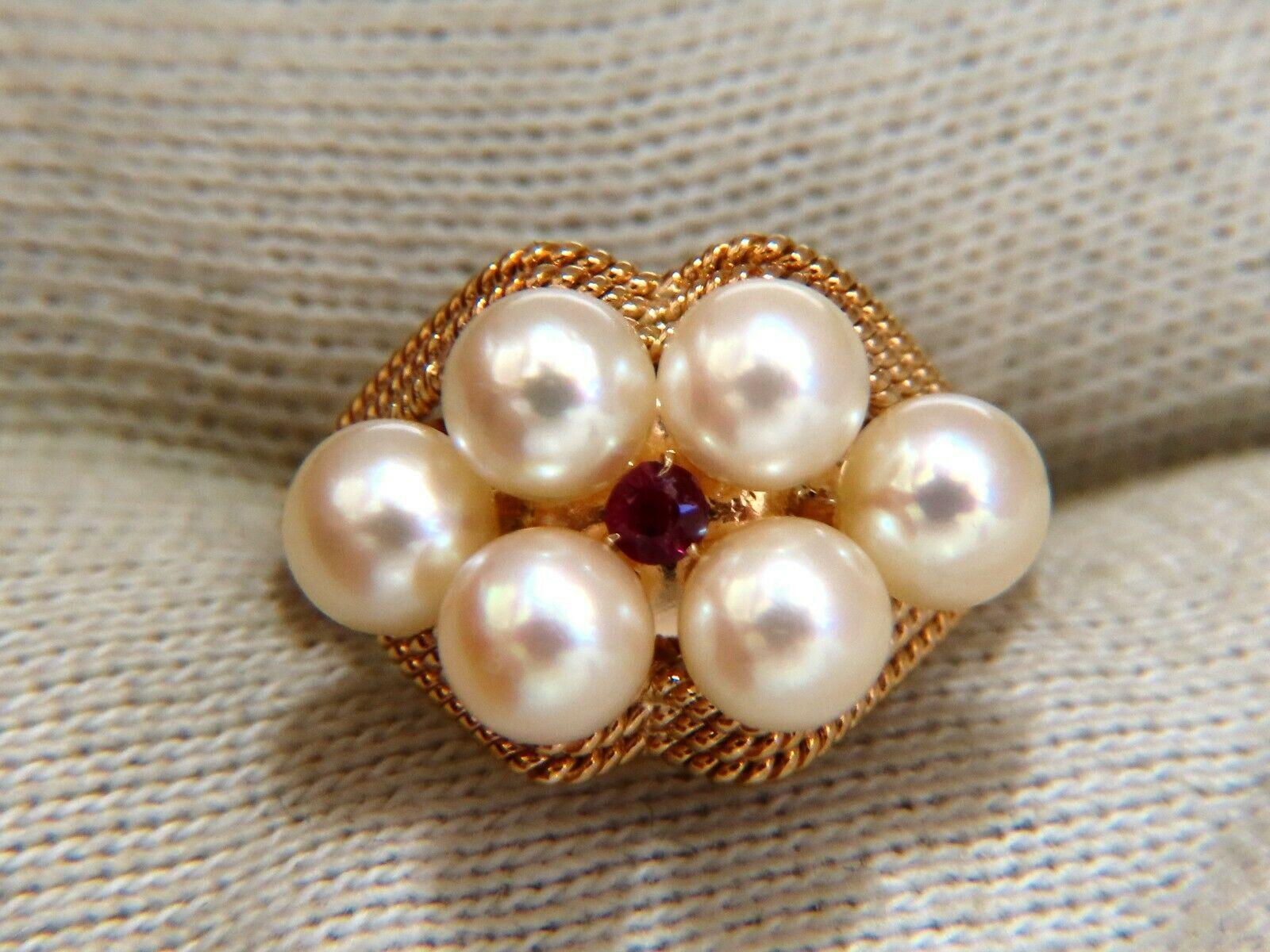 5mm Akoya Cream  Pearls Ring

.02ct Natural Round Ruby

14kt. yellow gold

3.9 grams.

Current ring size: 4.5

We may resize.

Ring: 12.8mm Wide

Depth of ring: 8.8mm