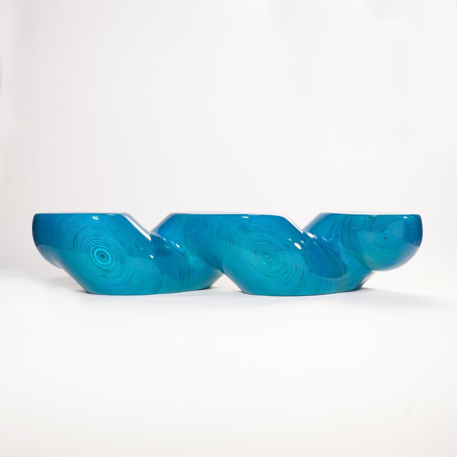 Ezra Ardolino, educated as an architect, is an artist and entrepreneur specializing in digital fabrication at the intersection of art, architecture, and design. With a deep understanding of materiality and robotic manufacturing techniques, he has