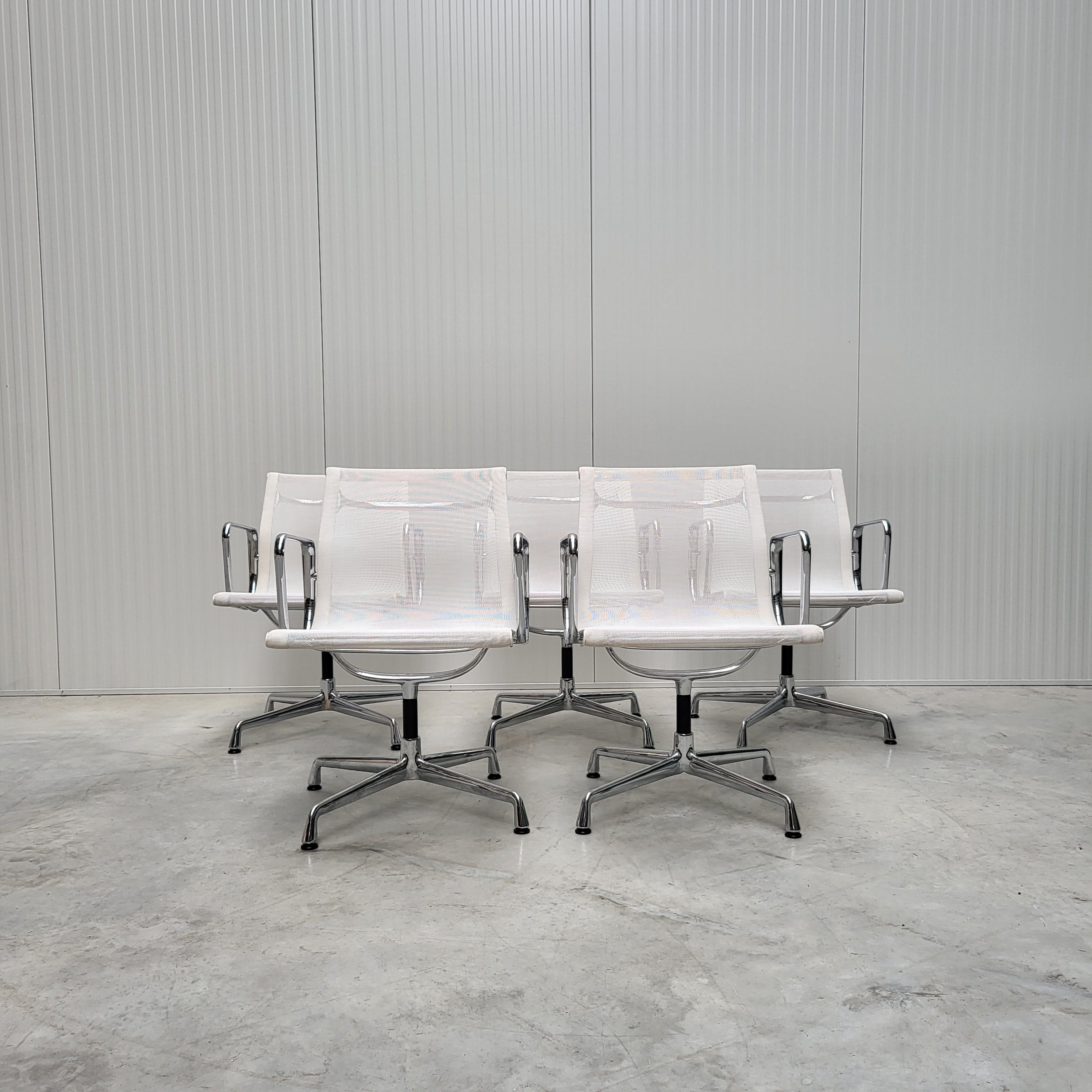 Nice set of 5 White netweave chairs model EA108 produced by Vitra. 
The chairs features a chromed aluminium frame and are all made in 2001.

The set is perfect useable in a dining or conference room.
The new retail price for a single chair is