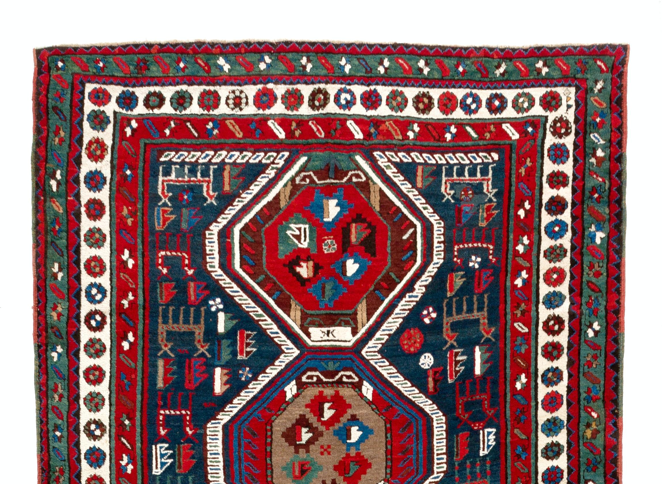 The Moghan Shahsavan rugs are typically made from wool or a wool-cotton blend and feature a tight, dense weave. The designs are usually geometric and feature bold, contrasting colors such as red, blue, and ivory. The designs may also incorporate