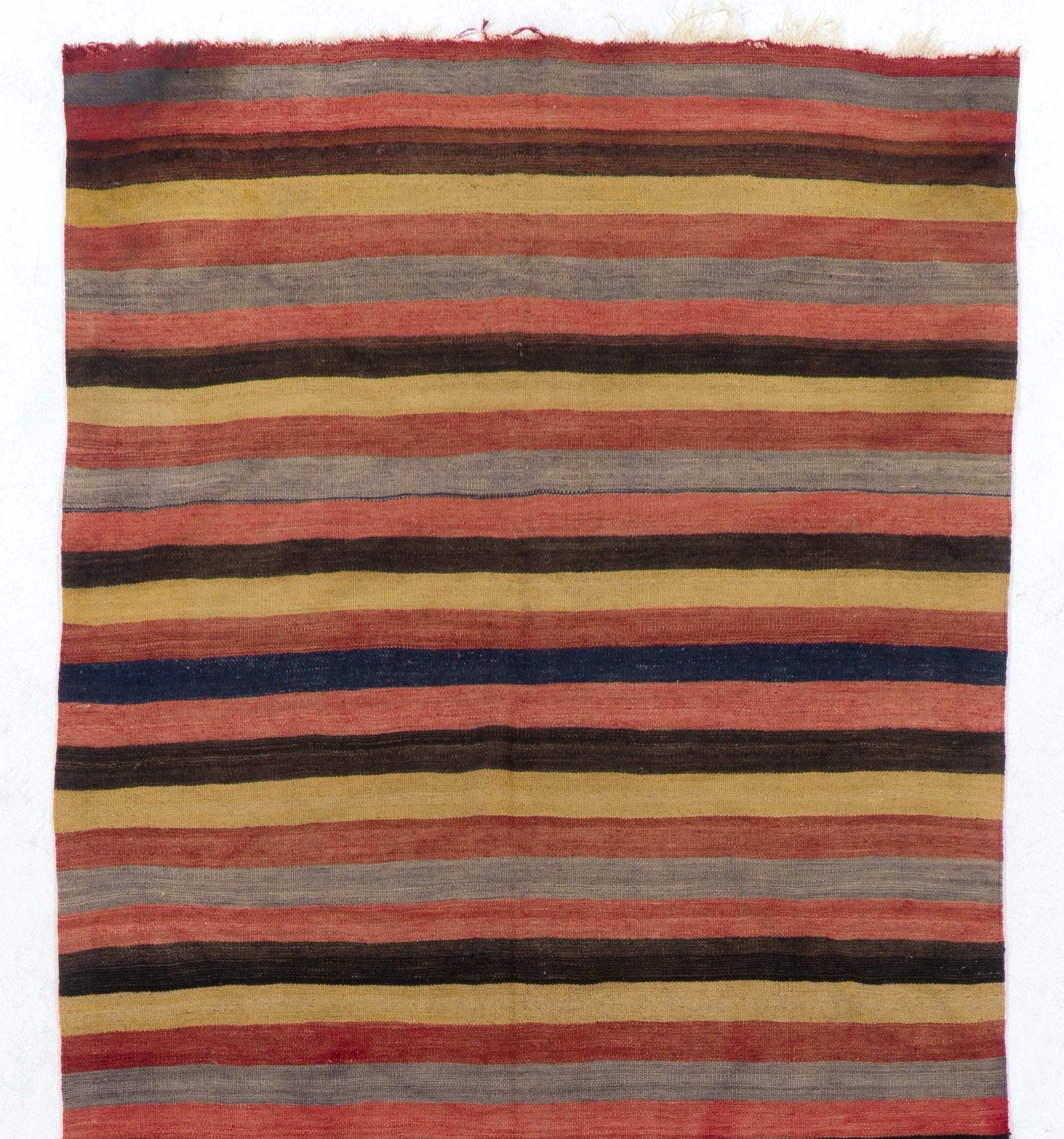 A simple yet beautiful wool rug handwoven by the nomadic tribes in South Central Turkey. Measures: 5 x 11 ft.
Very good condition, sturdy and clean. 
We can modify the dimensions if requested, ie. make it shorter and/or narrower. 
Reversible;