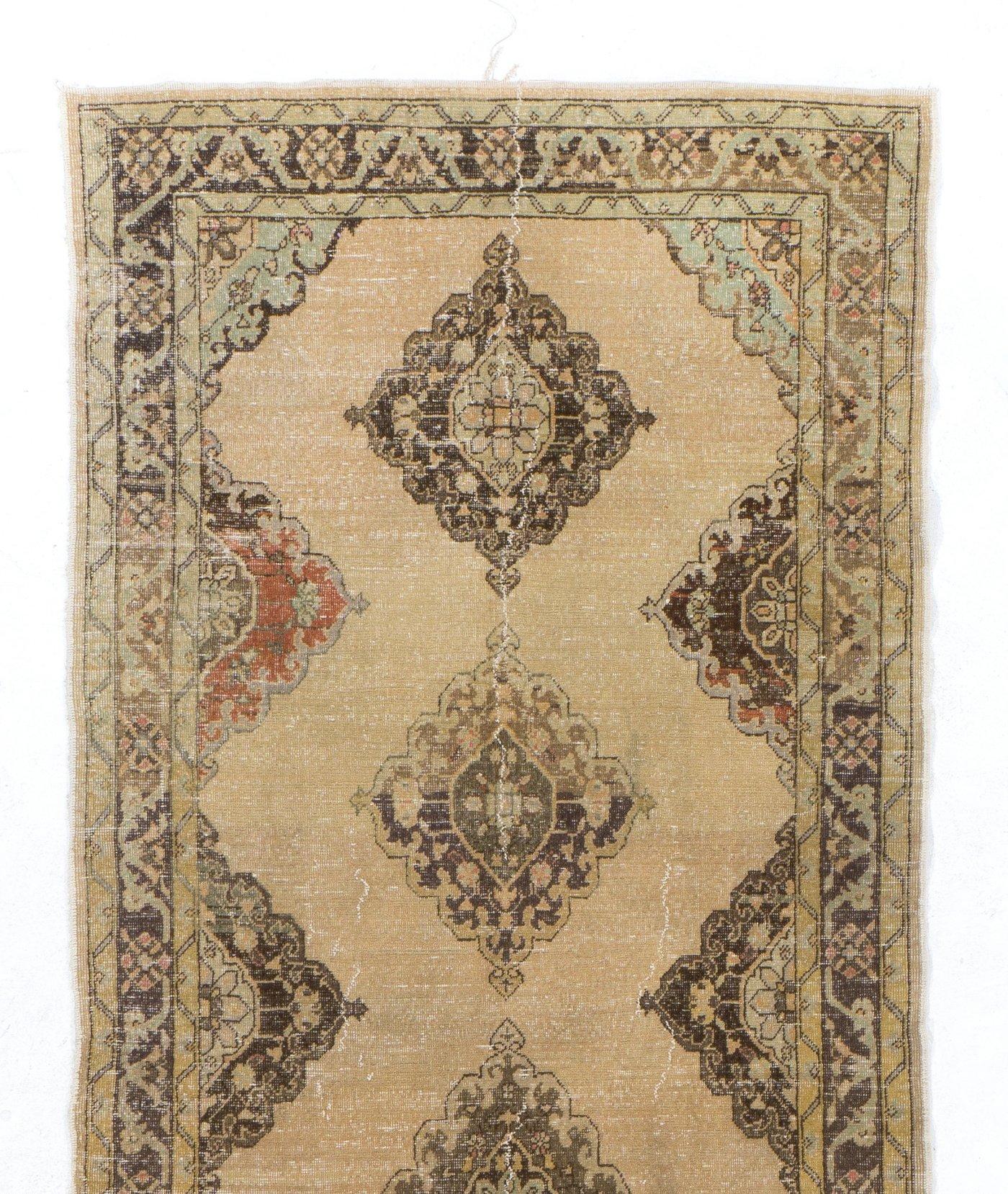 A mid 20th century hand knotted runner from Central Anatolia. Measures: 5 x 12.7 ft
Low wool on cotton foundation. Natural colors.
Good condition, sturdy and as clean as a brand new rug, washed professionally.