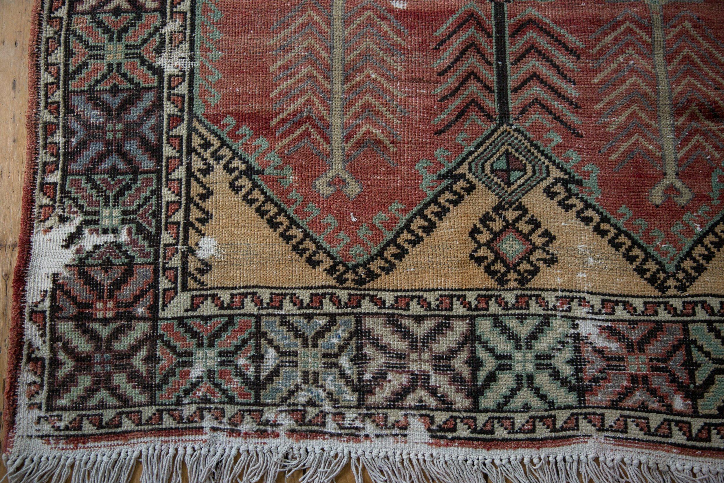 Mid-20th Century Vintage Distressed Oushak Rug Runner For Sale