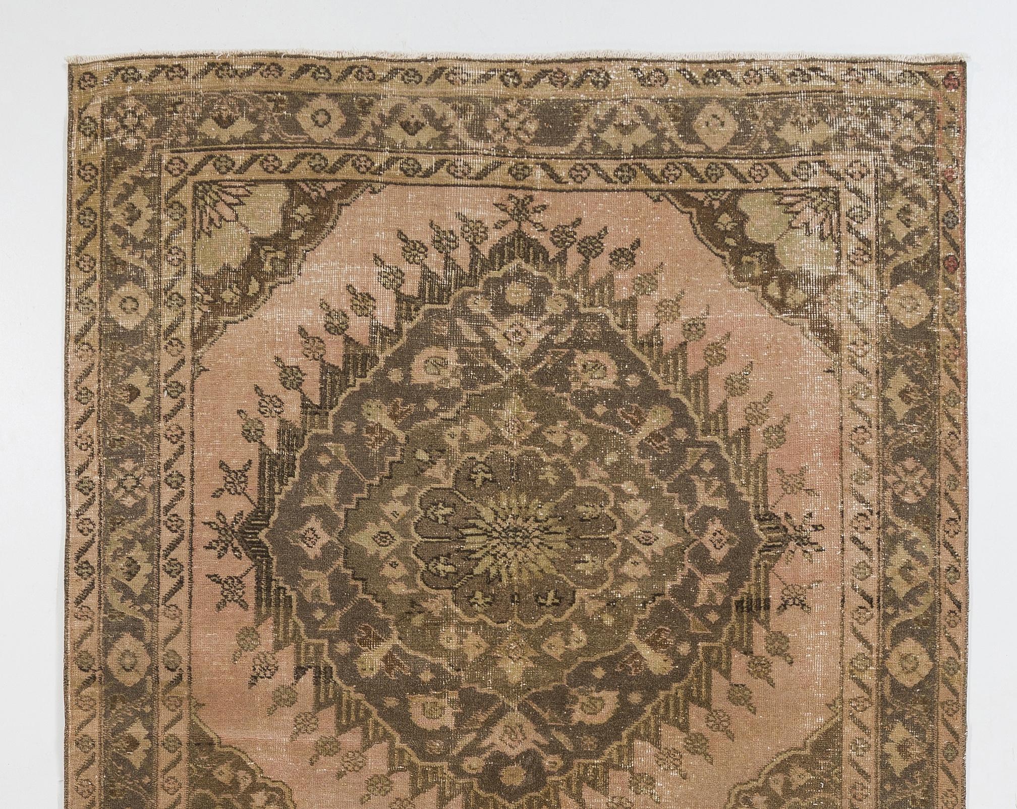 Step into the allure of centuries-old craftsmanship with the Vintage Handmade Turkish Oushak Runner Rug, a stunning testament to the artistry of Anatolian weavers. Originating from the historic region of Oushak in Turkey, this rug exudes timeless