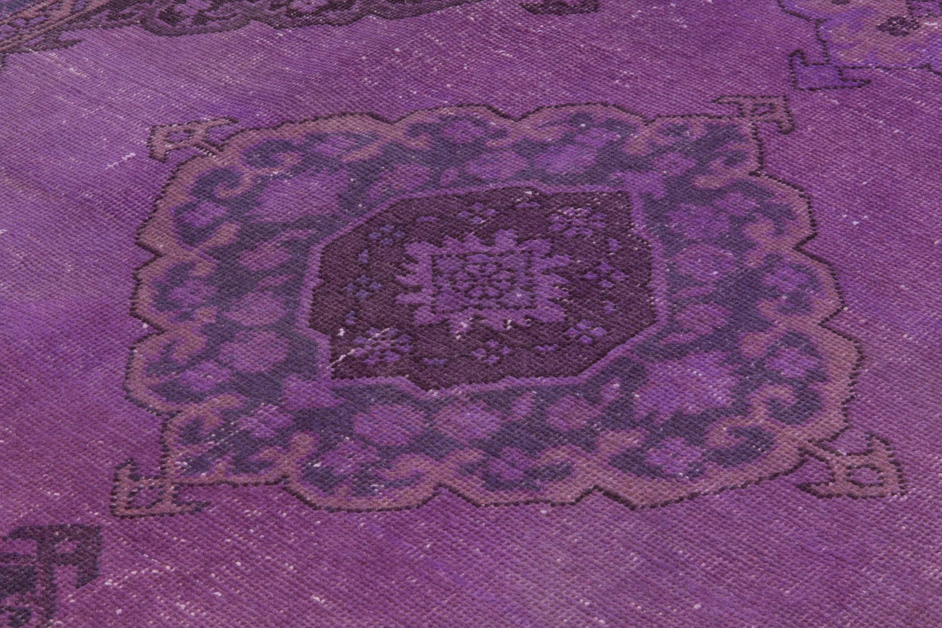 A vintage Turkish runner rug re-dyed in purple color. Great for contemporary interiors.
Finely hand knotted, low wool pile on cotton foundation. Professionally washed.
Sturdy and can be used on a high traffic area, suitable for both residential and