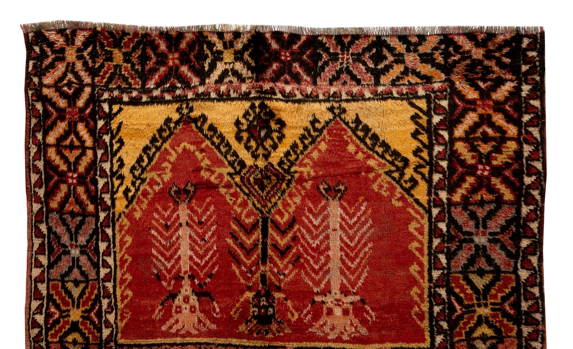 A vintage, one-of-a-kind, hand-knotted Tulu (Turkish word for thick-piled) rug from Konya in Central Anatolia, Turkey. These simple and somewhat small rugs with lustrous wool pile were made by nomads and villagers in Konya region of Central Anatolia