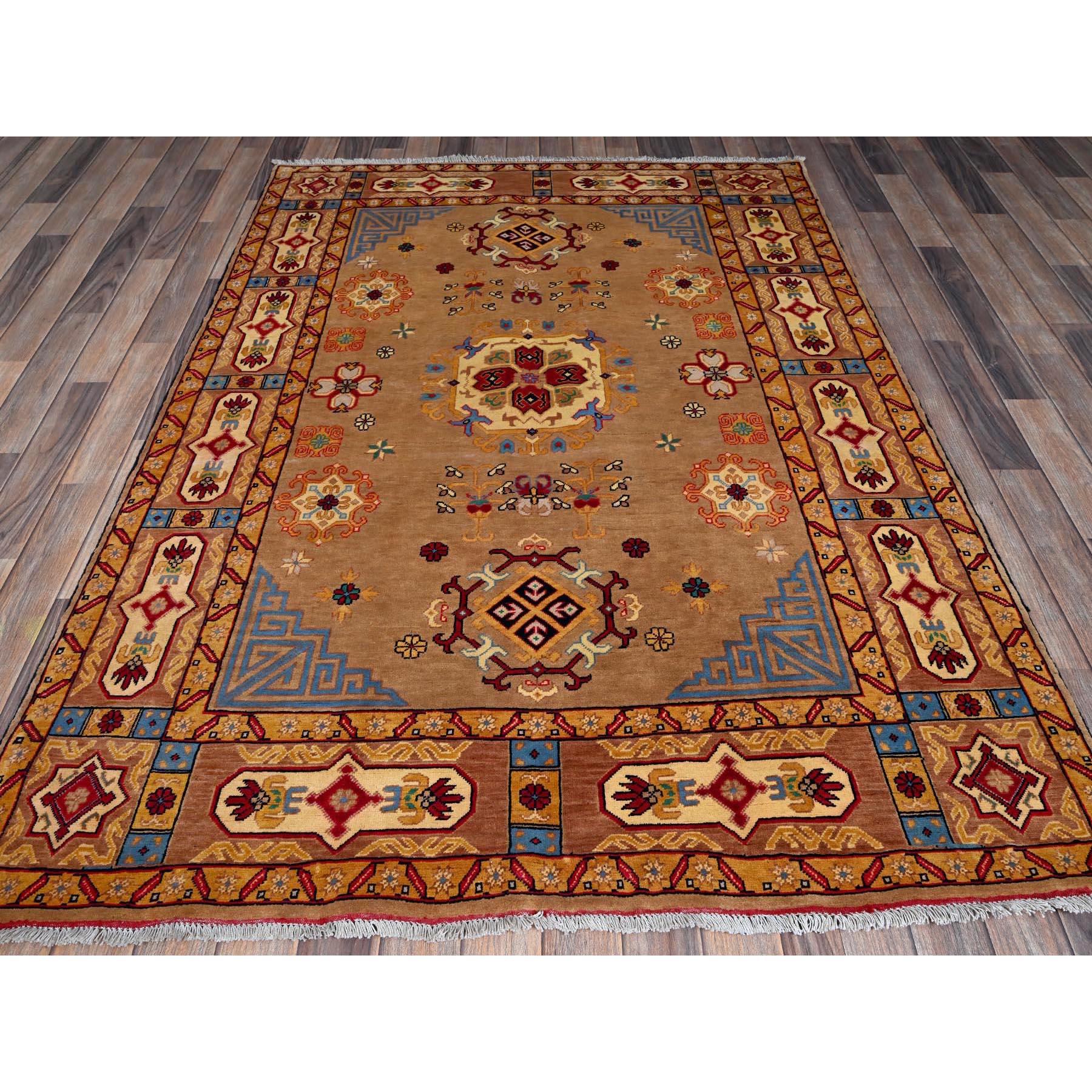 Nugget Brown, Afghan Khamyab with Khotan Design, Hand Knotted, Soft and Velvety Wool, Vegetable Dyes, Oriental Rug
Primary materials: Wool
Latex: No Pile 
height: 0.25 Inches
Style: Traditional
Primary color: Brown
Secondary colors: Red, Blue,