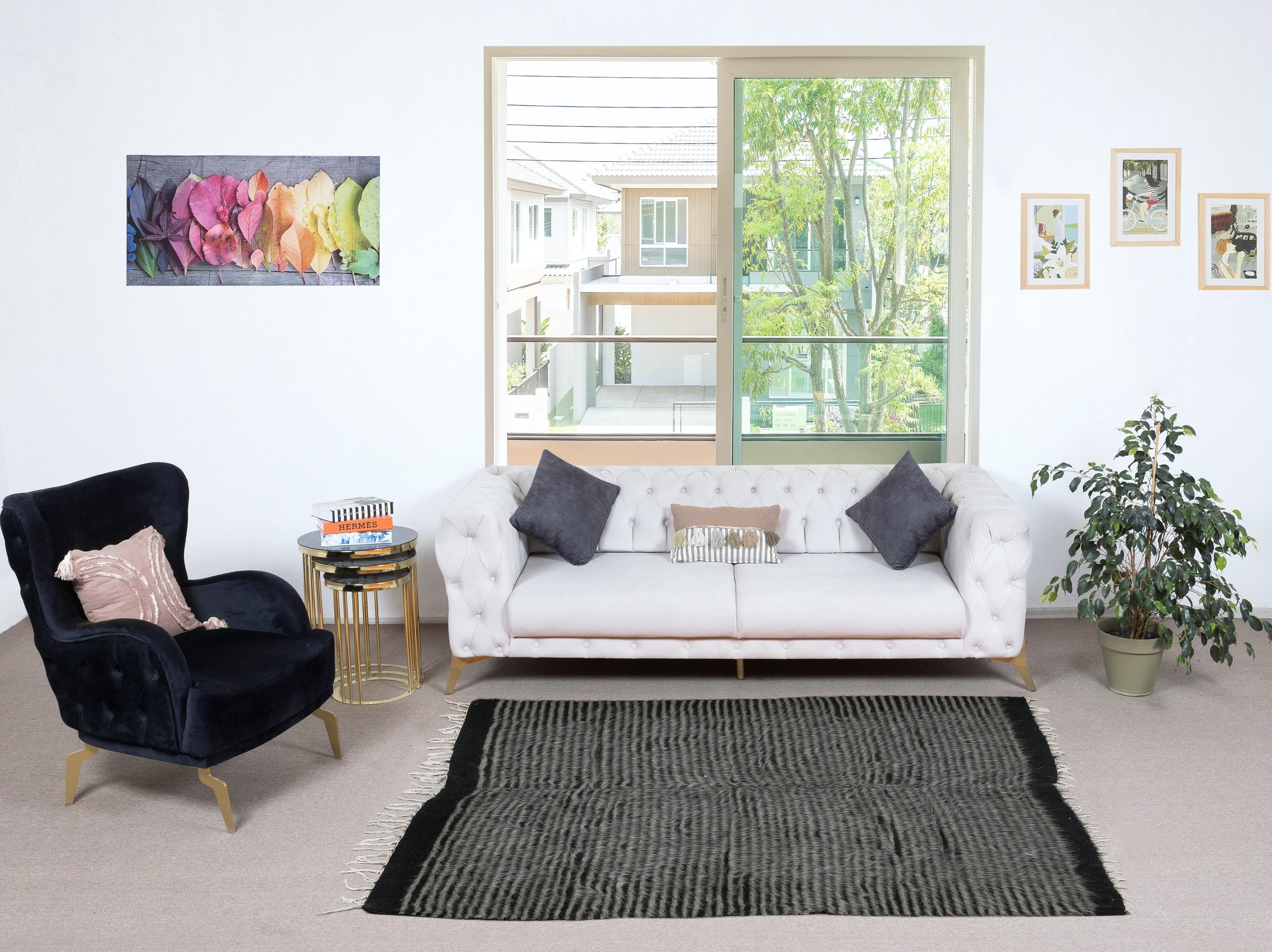 Decorative flat-weave Kurdish rug made of goat's wool, New production. Very Soft, floppy weave, ideal to use on the floor with a rug-pad or as a table cover, bed cover, wall hanging, sofa throw or blanket.

Size: 5 x 6.7 Ft (153 x 204 cm)
Age: