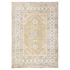 Alfombra de Lana Pura Anudada a Mano con Diseño de Nudo Turco de Aldea Anatolia Beige 5'x7