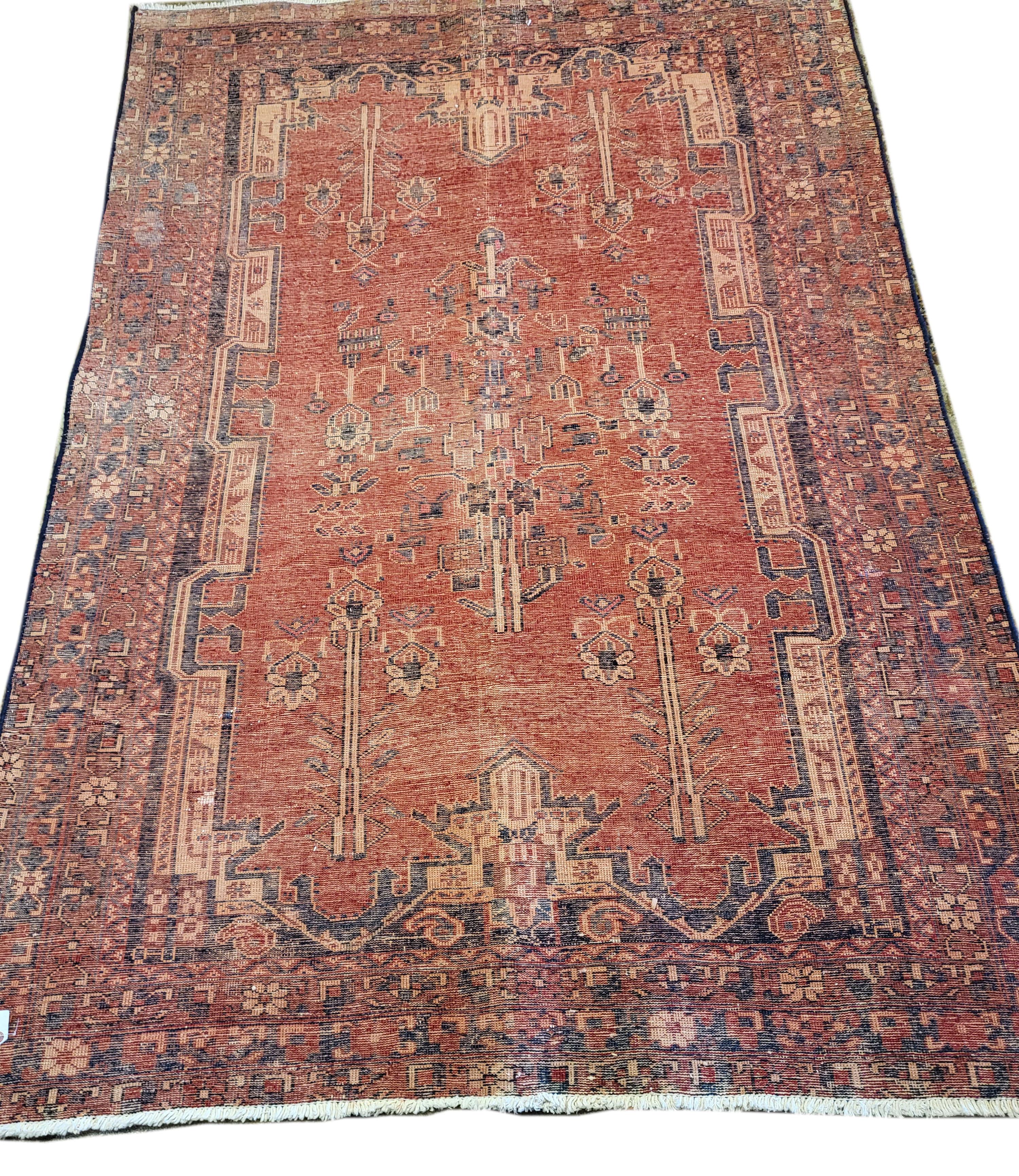 This 1950's Sirjan is incredibly exceptional. This piece is in amazing condition for the age and will look good for another 100 years to come. The rich, rusty tones are enhanced with beautifully intricate borders. The quality of the wool and