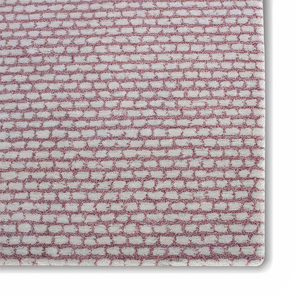 Soft pastel colours add a subtle feminine hint to a room. Inspired by the graceful dancing of ballerinas. This Area rug is perfect for any room. These Area rugs are Hand Tufted by artisans using the finest New Zealand wool. Measure: 5 x 4.