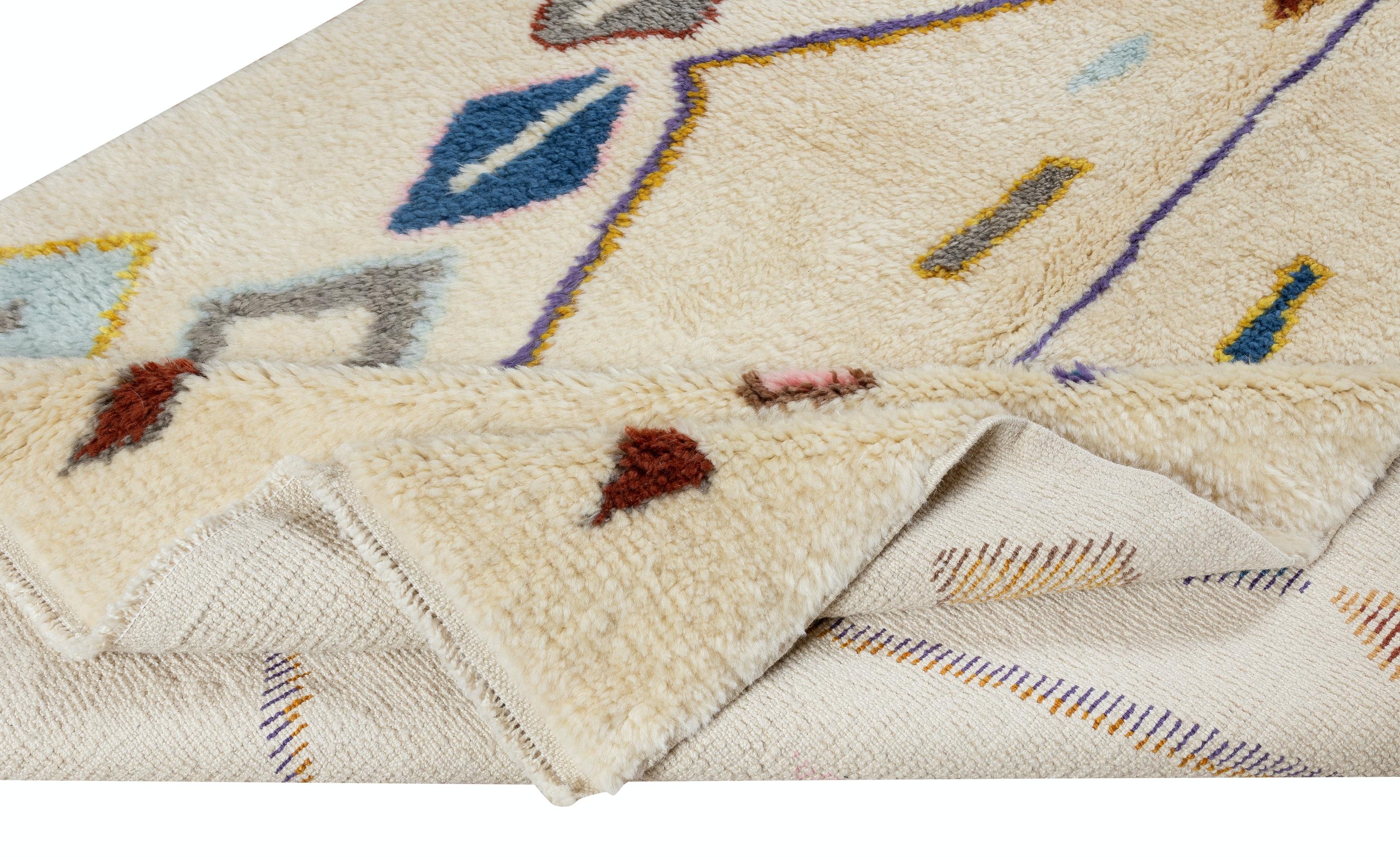 An exquisite brand-new Moroccan tulu rug hand knotted from fine hand-spun sheep's wool. A true statement piece that can easily be the focal point of any modern / contemporary or boho chic interiors. Very soft, luxurious, lush pile.

Available in the