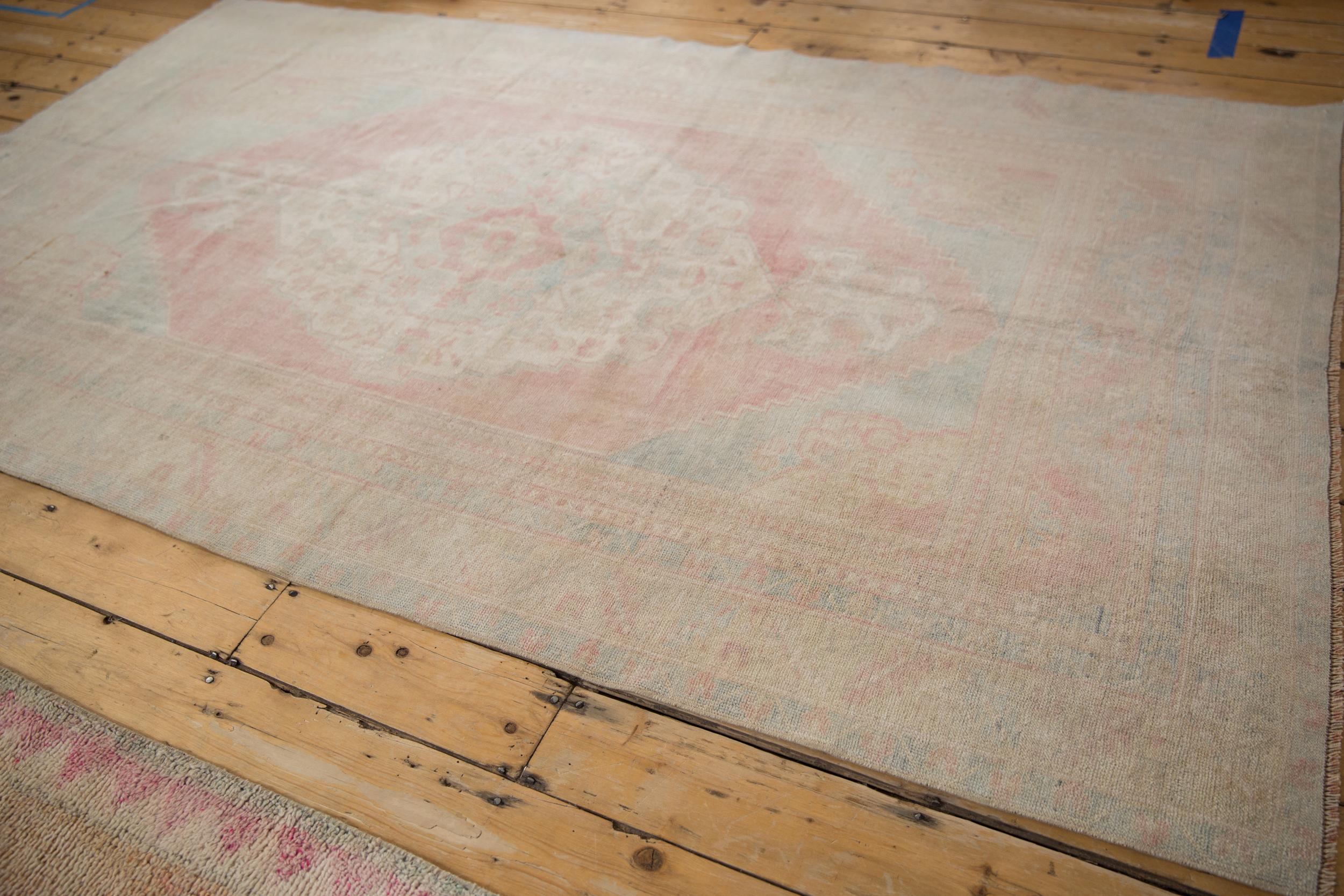 Late 20th Century Vintage Distressed Oushak Carpet For Sale